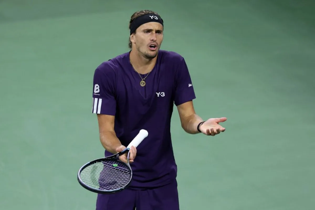 Germany's Alexander Zverev reacts after a point against Canada's Felix Auger-Aliassime during their men's singles third round match on day seven of the US Open tennis tournament at the USTA Billie Jean King National Tennis Center in New York City, on August 30, 2025.  CHARLY TRIBALLEAU / AFP