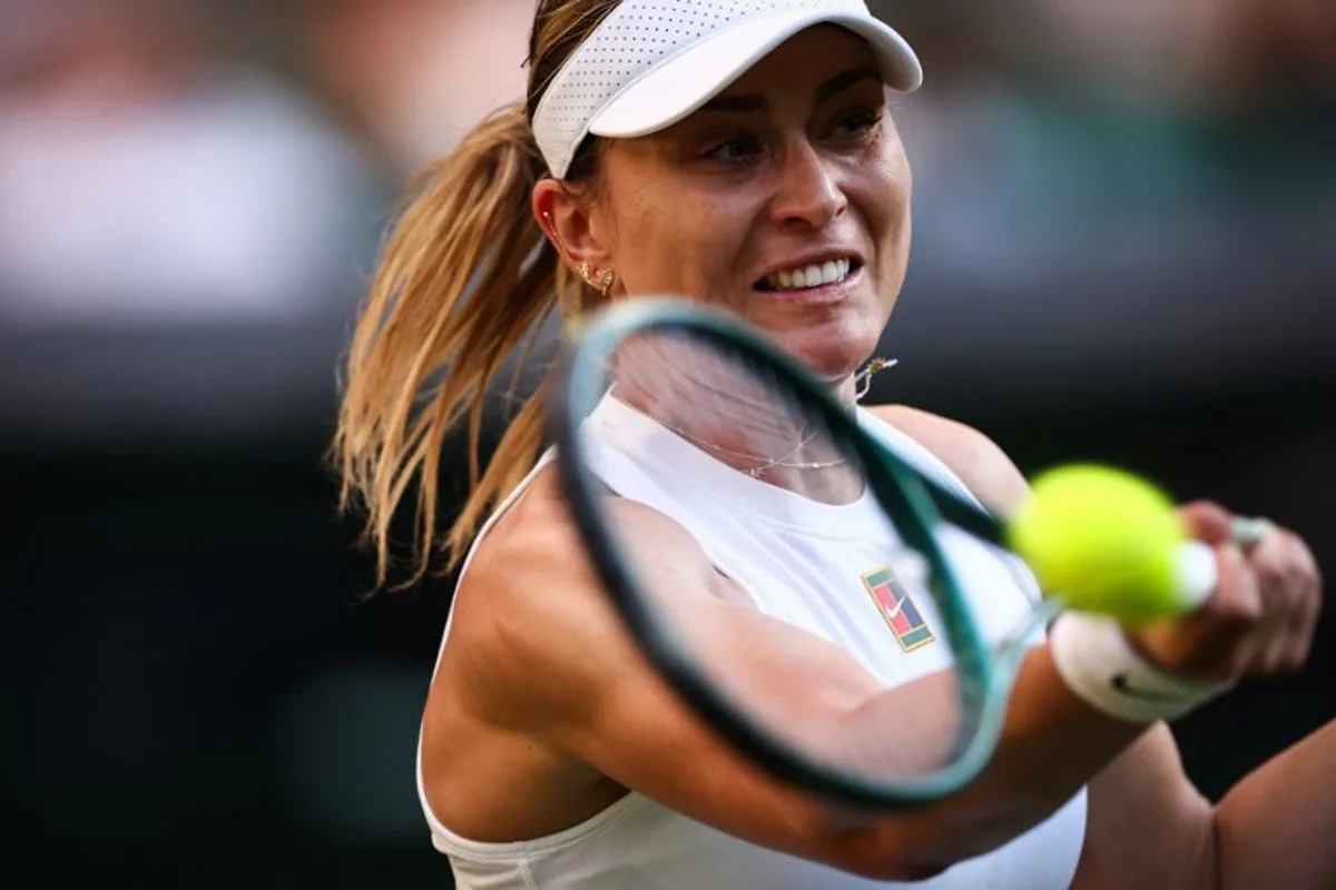 Spain's Paula Badosa plays a forehand return to Britain's Katie Boulter during their women's singles first round tennis match on the first day of the 2025 Wimbledon Championships at The All England Lawn Tennis and Croquet Club in Wimbledon, southwest London, on June 30, 2025.  HENRY NICHOLLS / AFP