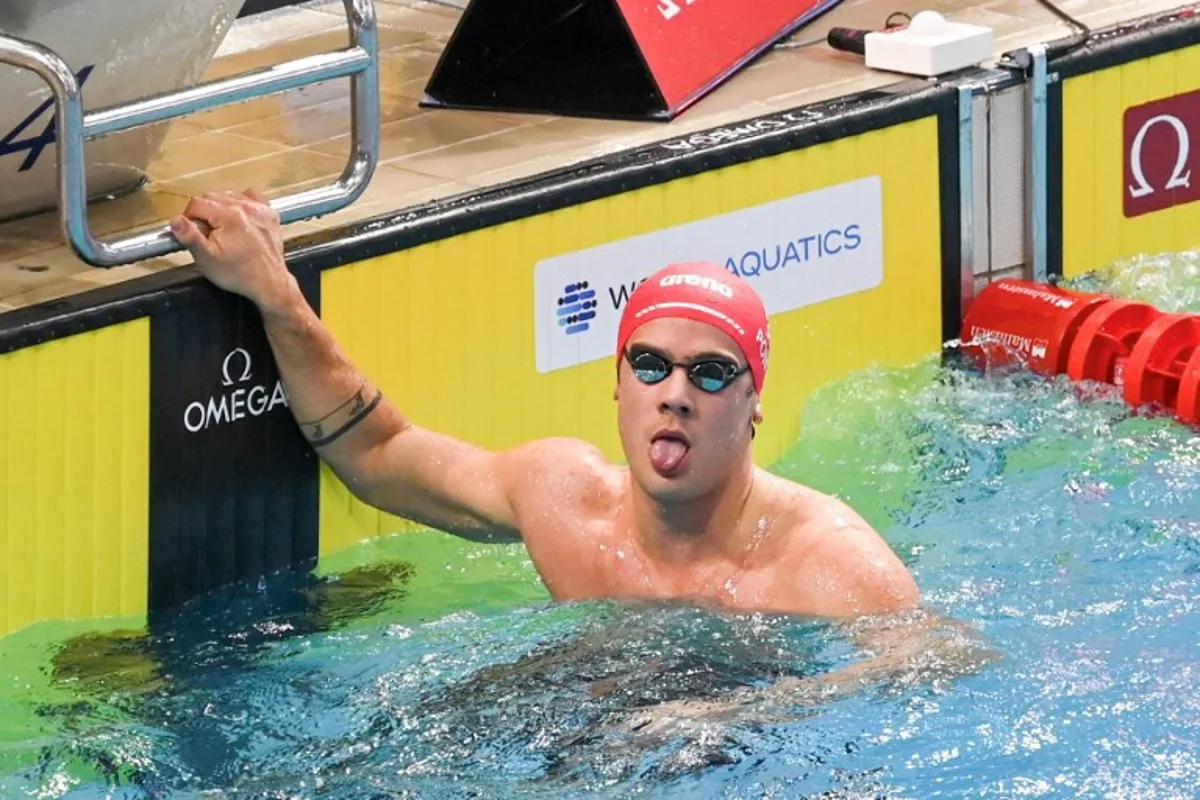 Noe Ponti of Switzerland celebrates winning the men's 50m butterfly heat event during the World Aquatics Swimming World Cup 2024 - Stop 3 in Singapore on November 2, 2024.  Roslan RAHMAN / AFP