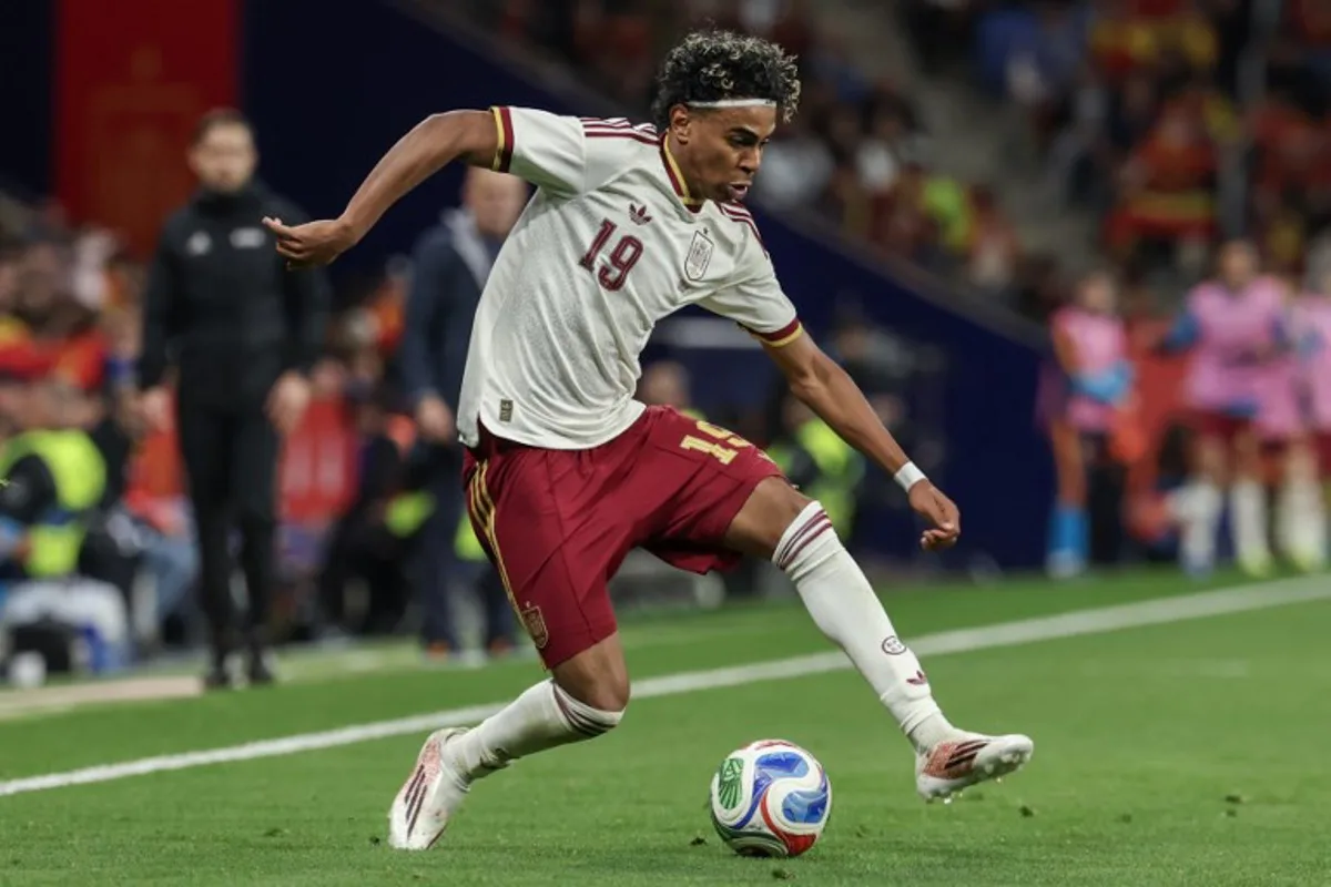 Spain's forward #19 Lamine Yamal controls the ball during the international friendly football match between Spain and Egypt at RCDE Stadium in Cornella de Llobregat, near Barcelona, on March 31, 2026. Lluis GENE / AFP