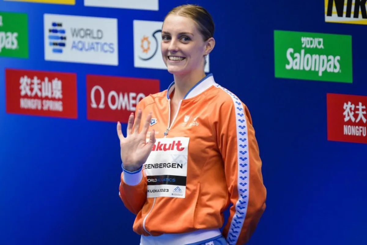 Bronze medallist Netherlands' Marrit Steenbergen poses during the medals ceremony for the women's 100m freestyle swimming event during the World Aquatics Championships in Fukuoka on July 28, 2023. François-Xavier MARIT / AFP