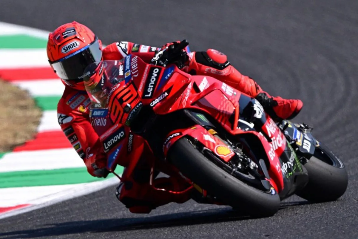 Ducati Lenovoi Team's Spanish MotoGP rider Marc Marquez steers his motorbike during the free practice sessions on the eve of the Italian Moto GP Grand Prix at Mugello circuit, in Mugello, near Florence, on June 21, 2025. Tiziana FABI / AFP