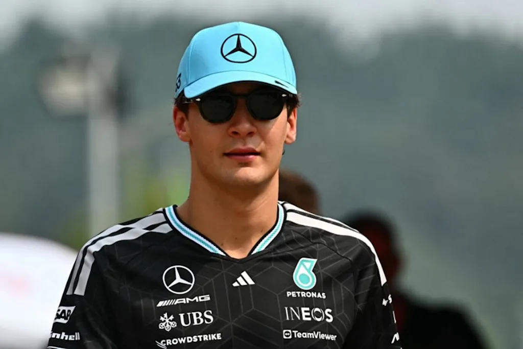 Mercedes' British driver George Russell arrives ahead of the Formula One Bahrain Grand Prix in Sepang on October 4, 2026.  Lillian SUWANRUMPHA / AFP