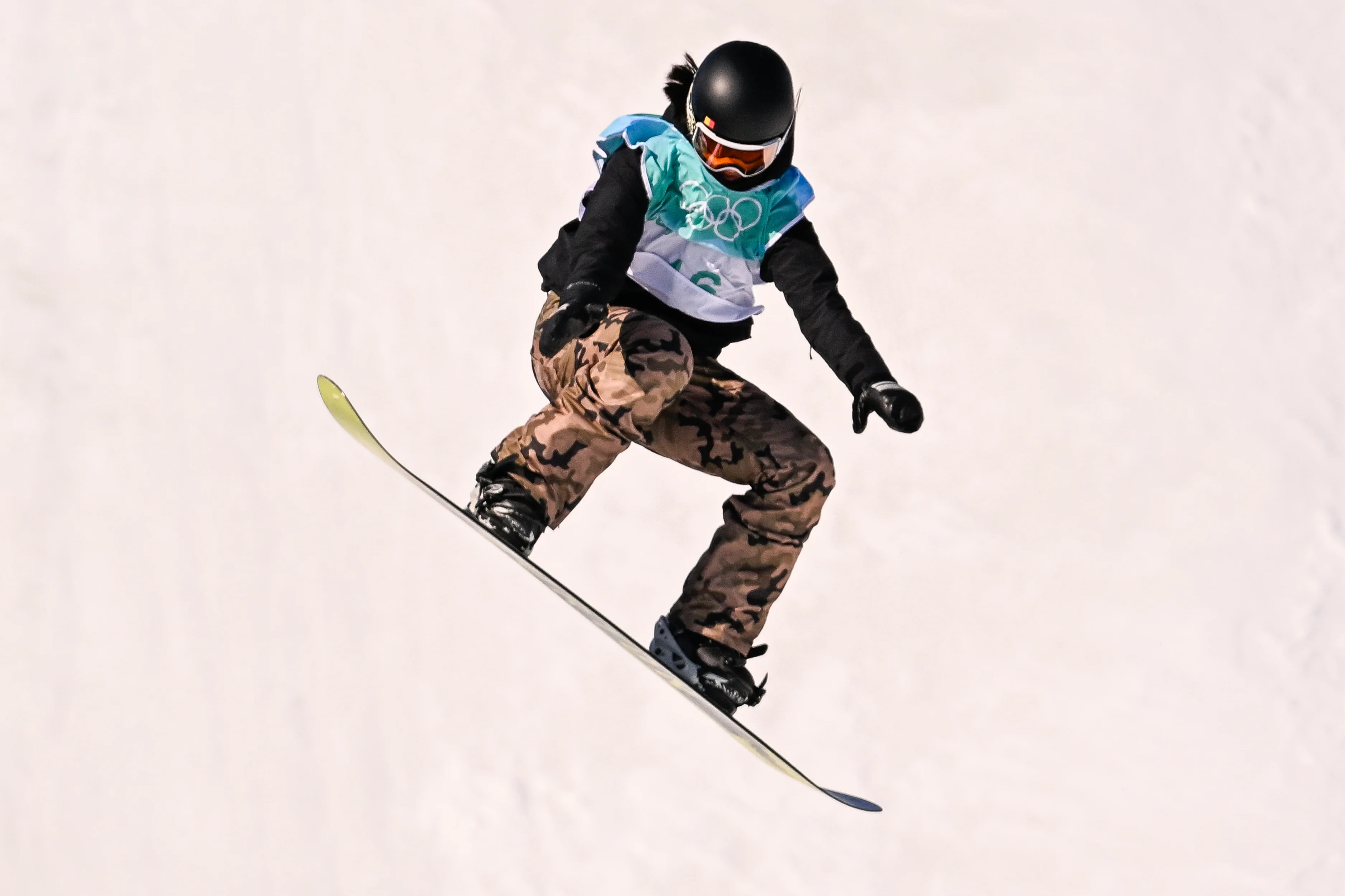 Belgian snowboarder Evy Poppe pictured in action during the second run of qualifications of the women's Snowboard Big Air event at the Beijing 2022 Winter Olympics in Beijing, China, Saturday 12 February 2022. The winter Olympics are taking place from 4 February to 20 February 2022. BELGA PHOTO LAURIE DIEFFEMBACQ