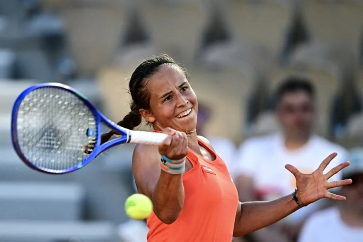 Belgium's Hanne Vandewinkel plays a forehand return to US Madison Keys during their women's singles match on day 3 of the French Open tennis tournament on Court Simonne-Mathieu at the Roland-Garros Complex in Paris on May 26, 2026. JULIEN DE ROSA / AFP