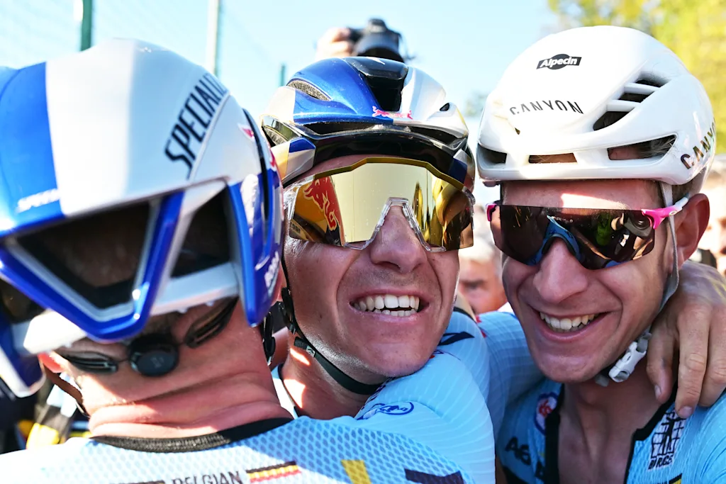 Belgium's Remco Evenepoel and Belgium's Ramses Debruyne celebrate after winning the elite men Road Race race (196,2 km) at the cycling UEC Road European Championships, in Ljubljana, Slovenia Sunday 4 October 2026. The UEC Road European Championships are taking place from 02 to 07 October in Ljubljana, Slovenia. BELGA PHOTO DAVID PINTENS