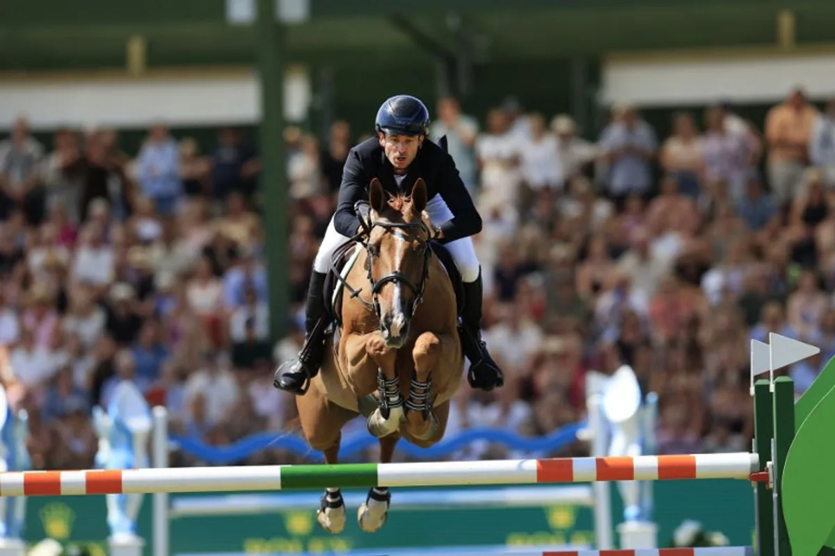Switzerland's Steve Guerdat competes on the horse "Albfuehren's Iashin Sitte" during the Falsterbo Nations Cup 2026 international show jumping event as part of the Falsterbo Horse Show in Falsterbo, Sweden, on July 12, 2026. Andreas Hillergren / TT / TT News Agency / AFP