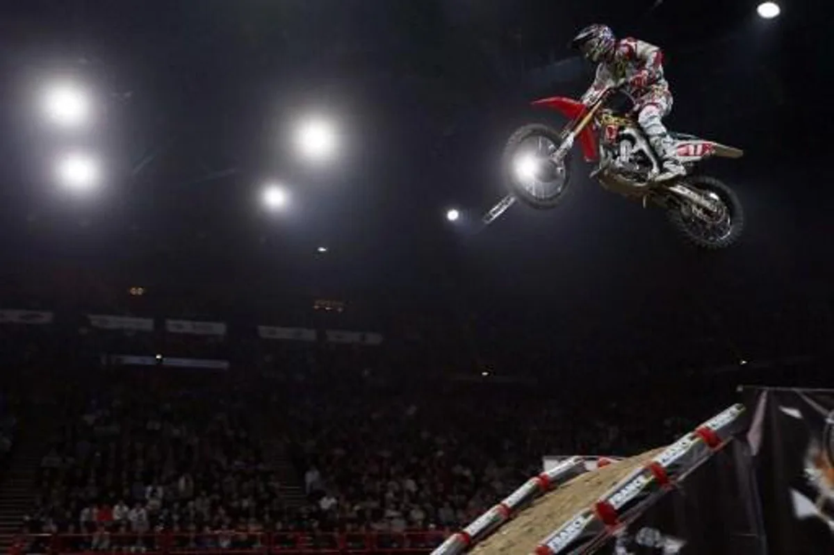 US rider Eli Tomac competes during the 30th edition of the Paris-Bercy Supercross event on November 11, 2012 at the Palais Omnisports de Bercy in Paris. AFP PHOTO/KENZO TRIBOUILLARD