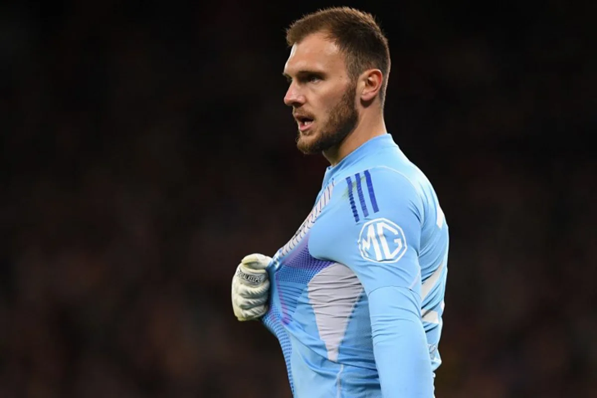 Lyon's Brazilian goalkeeper #23 Lucas Perri complains to the officials after conceding their second goal during the UEFA Europa league quarter-final final, second leg football match between Manchester United and Lyon at Old Trafford stadium in Manchester, north west England, on April 17, 2025. Oli SCARFF / AFP