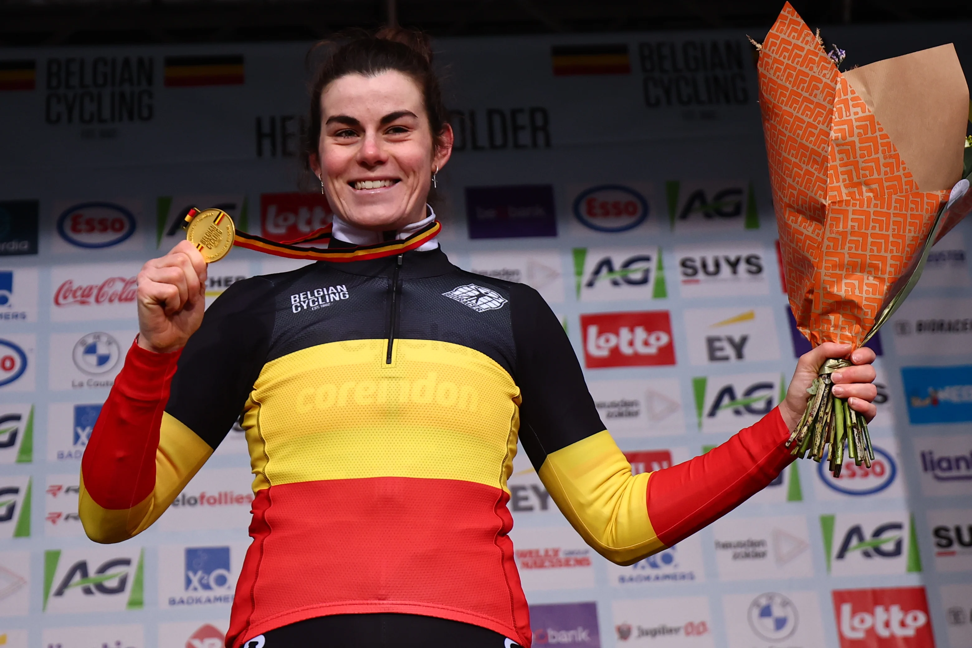 Belgian Marion Norbert Riberolle celebrates on the podium after winning the women Elite race of the Belgian Championships cyclocross (11-12/01) on Saturday 11 January 2025 in Heusden-Zolder. BELGA PHOTO DAVID PINTENS