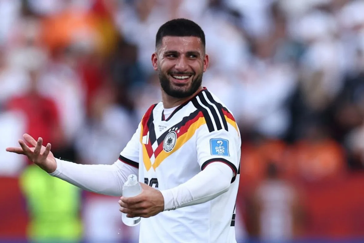Germany's forward #26 Deniz Undav celebrates his team's victory at the end of the 2026 World Cup Group E football match between Germany and Ivory Coast at the Toronto Stadium in Toronto on June 20, 2026.   Cole Burston / AFP
