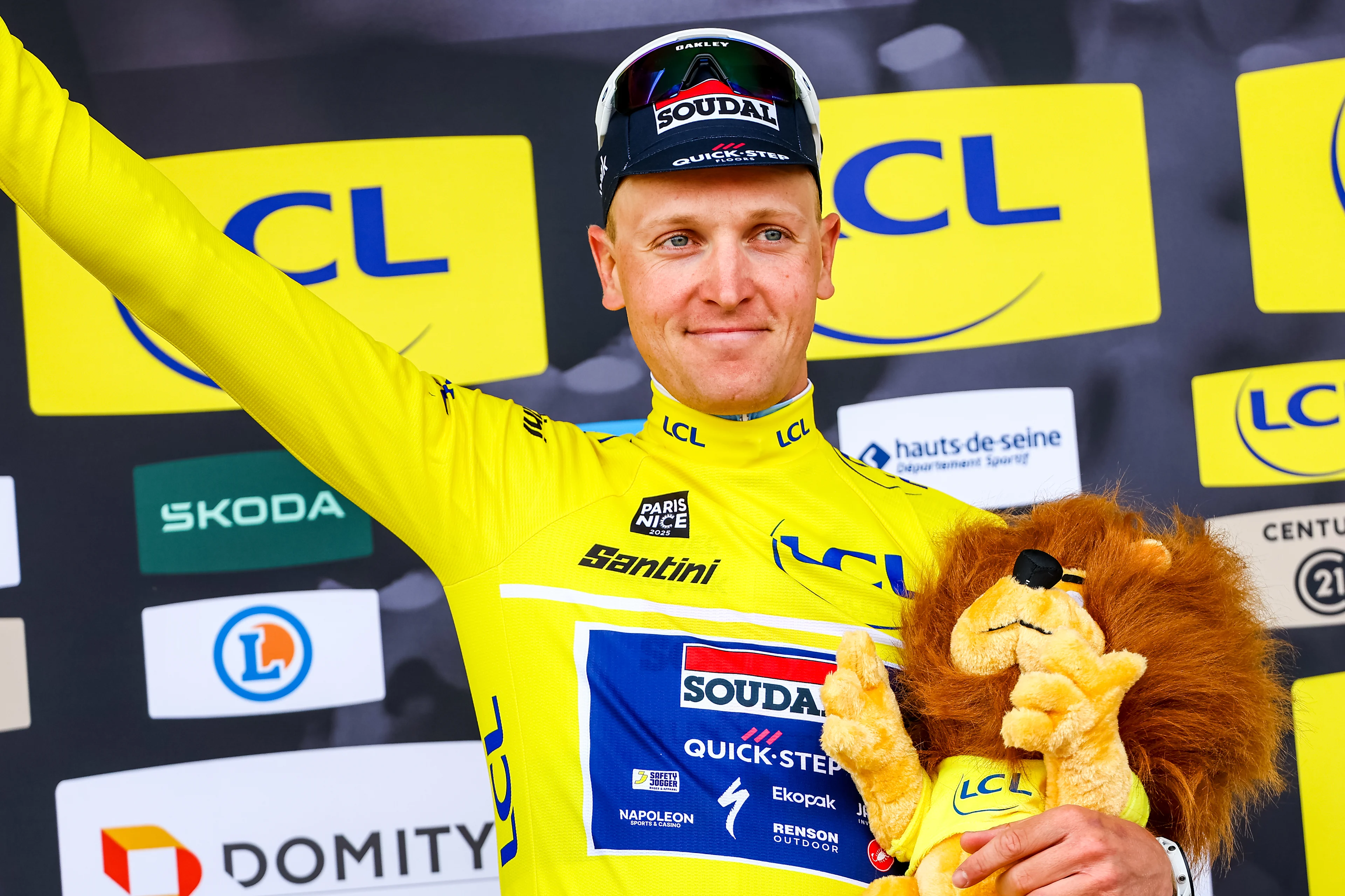 Belgian Tim Merlier of Soudal Quick-Step celebrates in the yellow jersey of leader in the overall ranking after the first stage of 83th edition of the Paris-Nice cycling race, from and to Le Perray-en-Yvelines (156,5km), Sunday 09 March 2025. BELGA PHOTO DAVID PINTENS