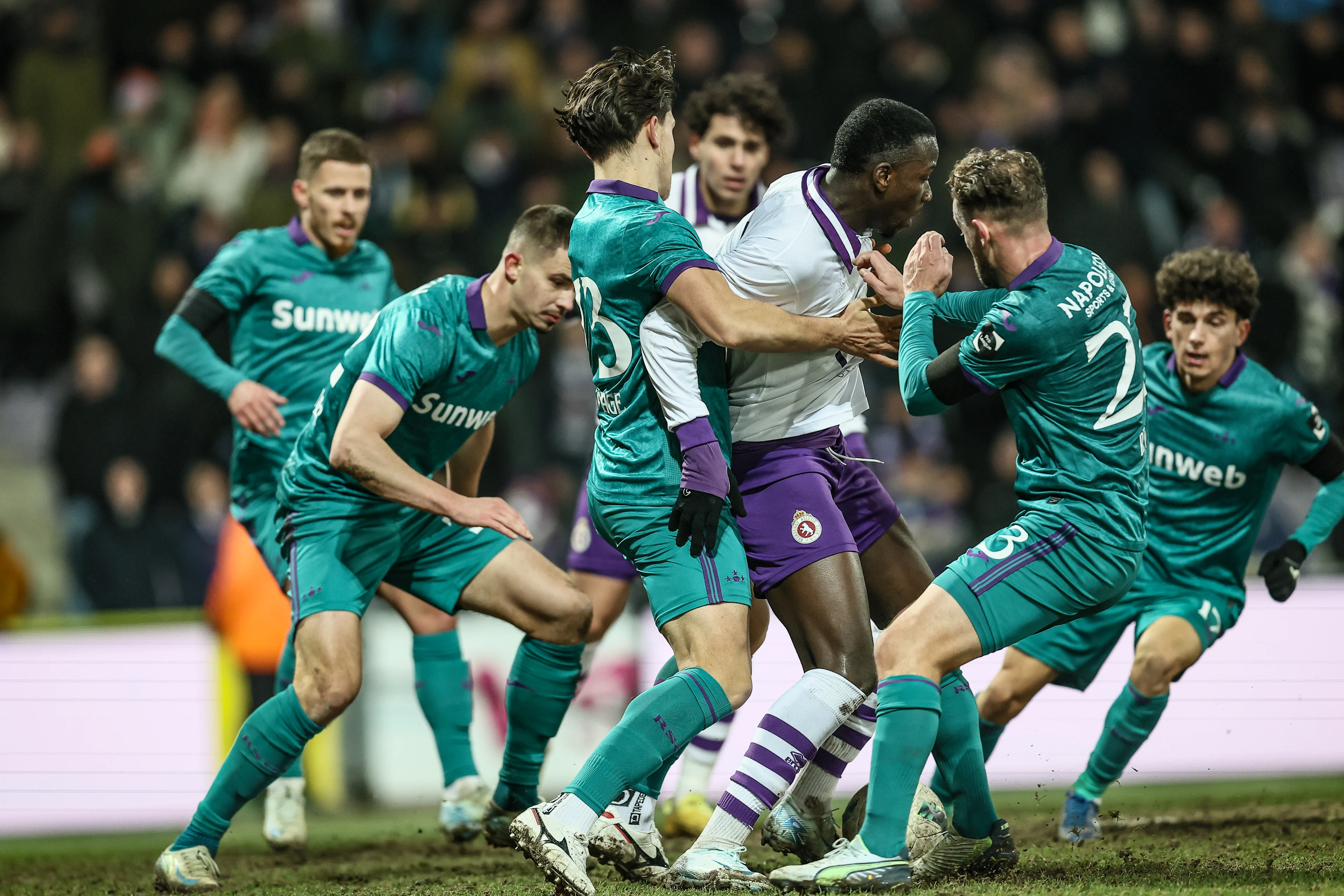 Anderlecht's Amando Lapage and Beerschot's Charly Keita fight for the ball during a soccer game between Beerschot VA and RSC Anderlecht, Thursday 09 January 2025 in Antwerp, in the 1/4 finals of the 'Croky Cup' Belgian soccer cup. BELGA PHOTO BRUNO FAHY