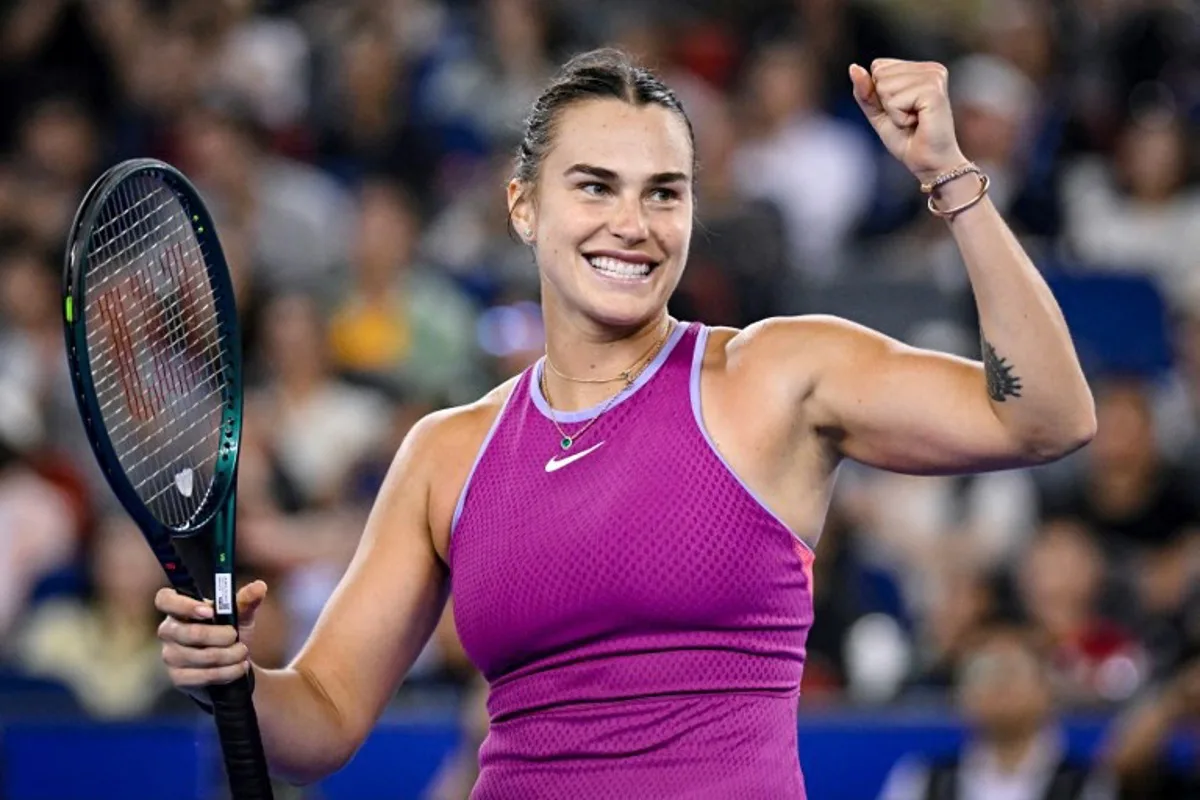 Belarus's Aryna Sabalenka celebrates after her victory against China's Zheng Qinwen in their women's singles final match at the Wuhan Open tennis tournament in Wuhan, China's Hubei province on October 13, 2024.  WANG Zhao / AFP
