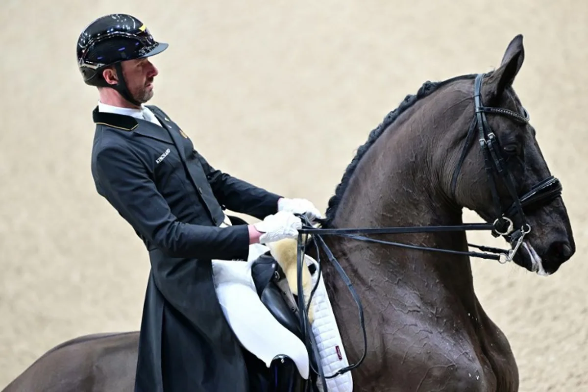 Belgium's Domien Michiels is pictured on the horse Intermezzo van het Meerdaalhof during the FEI Dressage World Cup Grand Prix at the Gothenburg Horse Show at the Scandinavium Arena in Gothenburg, Sweden, on February 21, 2025.   Bjorn LARSSON ROSVALL / TT NEWS AGENCY / AFP