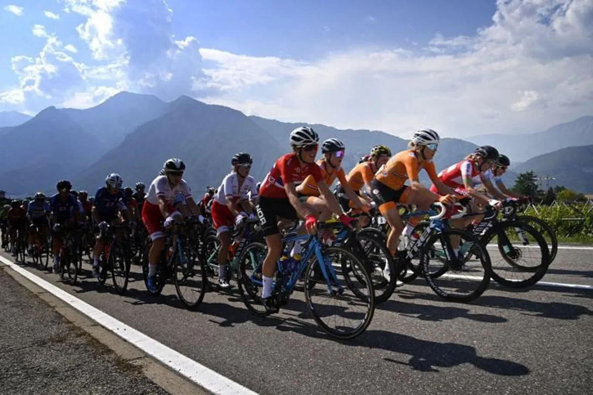 Netherlands' Ellen Van Dijk (C) leads the pack before she won the UEC European women Elite road cycling championships in Trento, on September 11 2021.   Alberto PIZZOLI / AFP