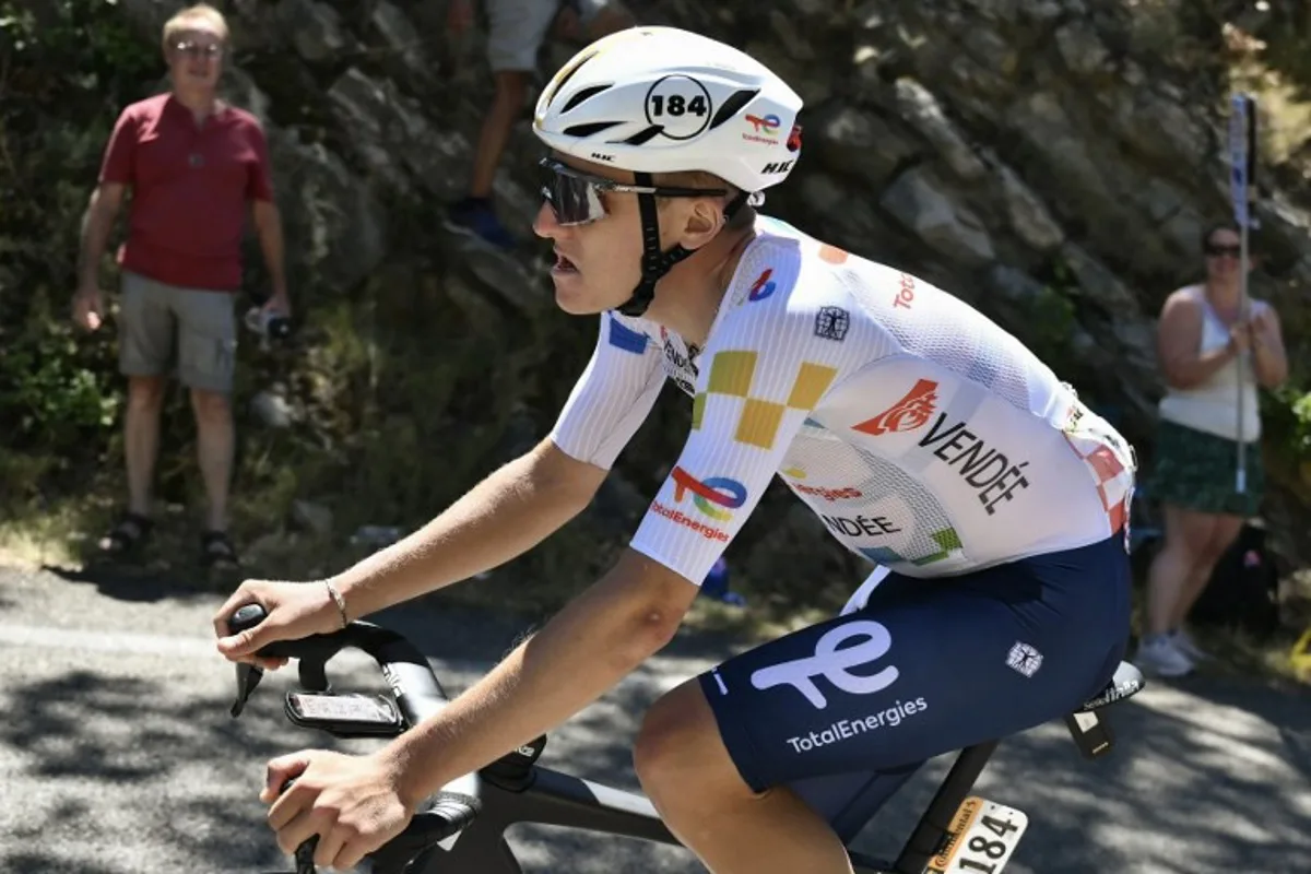 Team TotalEnergies' French rider Thomas Gachignard is distanced at the back of the pack of riders (peloton) during the 16th stage of the 112th edition of the Tour de France cycling race, 171.5 km between Montpellier and Mont Ventoux, southern France, on July 22, 2025. Marco BERTORELLO / AFP