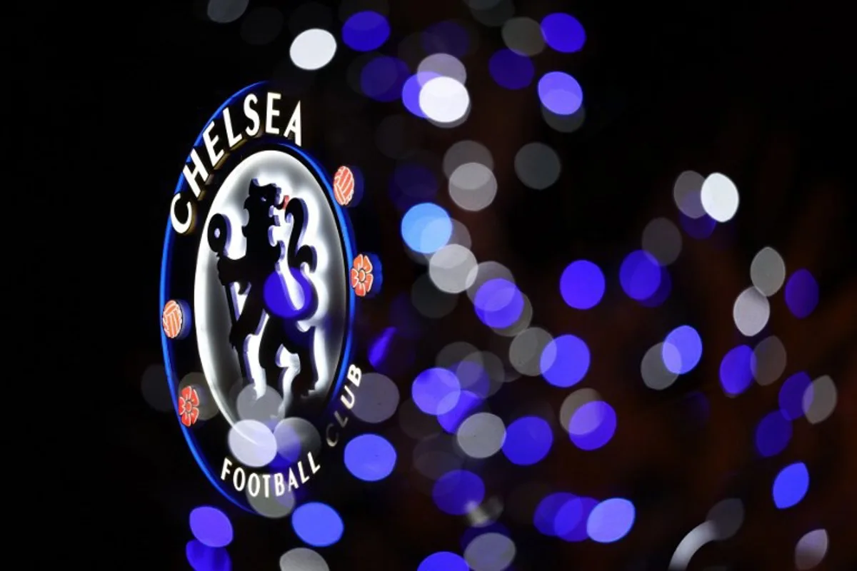 The Chelsea logo is seen through Christmas decorations ahead of the English Premier League football match between Chelsea and Bournemouth at Stamford Bridge in London on December 30, 2025.  Adrian Dennis / AFP