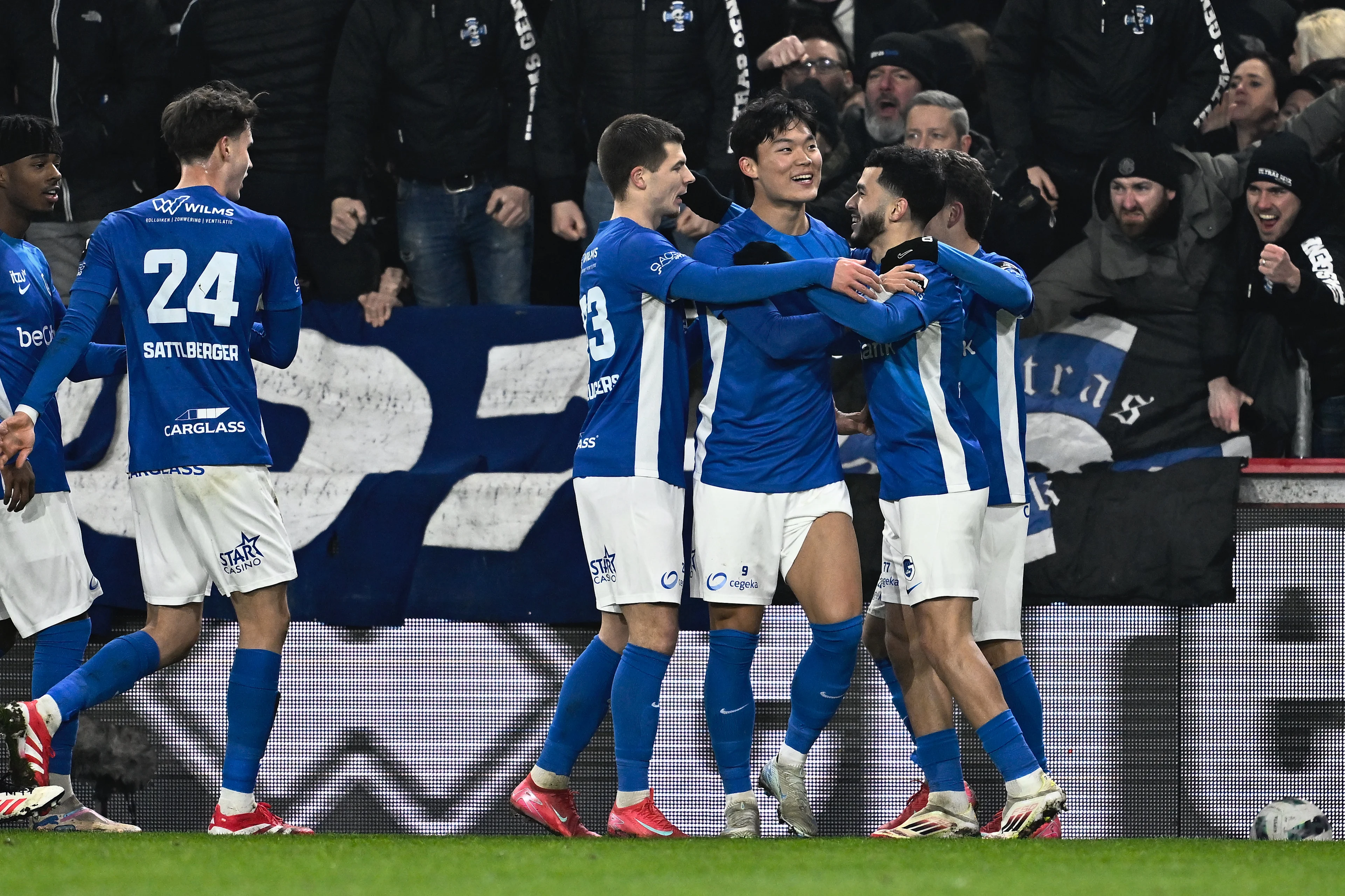 Genk's Nicolas Sattlberger, Genk's Jarne Steuckers, Genk's Hyon-Gyu Oh and Genk's Zakaria El Ouahdi celebrate after scoring during a soccer match between KV Mechelen and KRC Genk, Saturday 18 January 2025 in Mechelen, on day 22 of the 2024-2025 season of the 'Jupiler Pro League' first division of the Belgian championship. BELGA PHOTO JOHAN EYCKENS