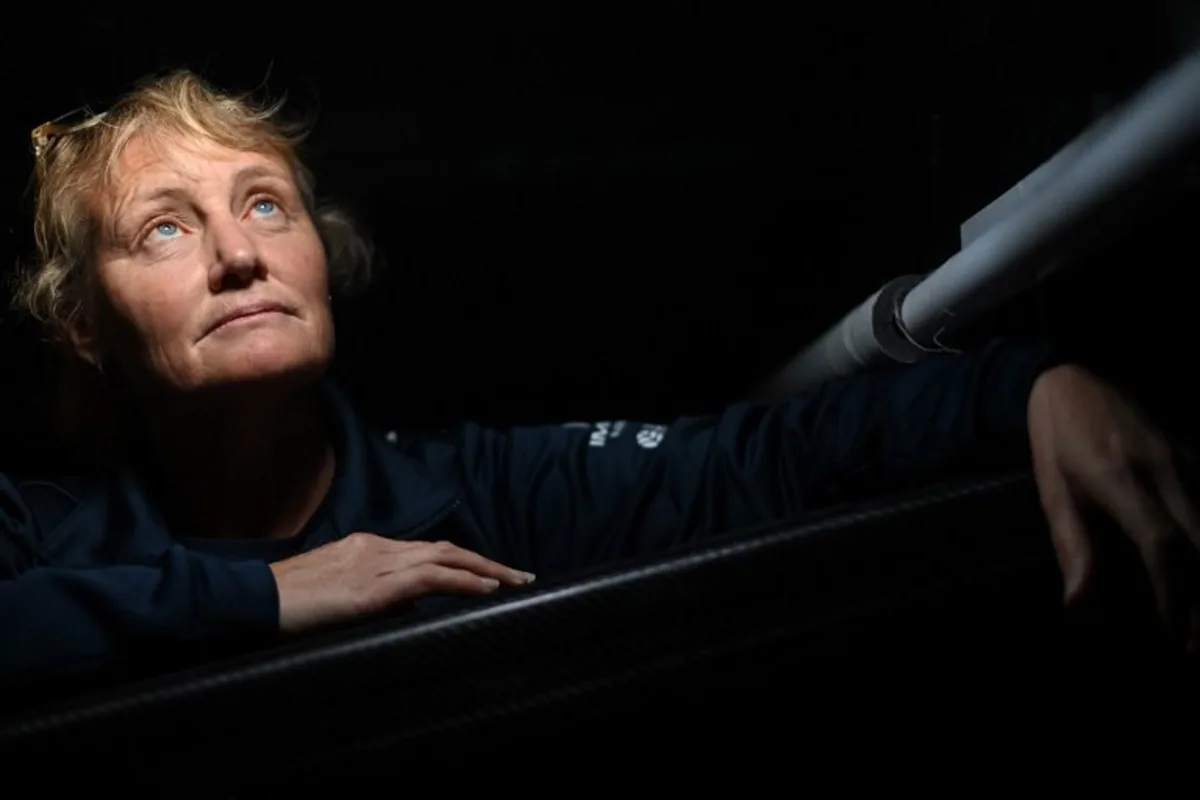 British skipper Pip Hare poses for a photograph aboard her Imoca monohull "Medallia" at the starting site of the 10th edition of the Vendee Globe around the world monohull solo sailing race, at the Vendee Globe village in Les Sables-d'Olonne, western France on November 8, 2024. The 10th Vendee Globe will start on November 10, 2024 in Les Sables d'Olonne. Sebastien Salom-Gomis / AFP