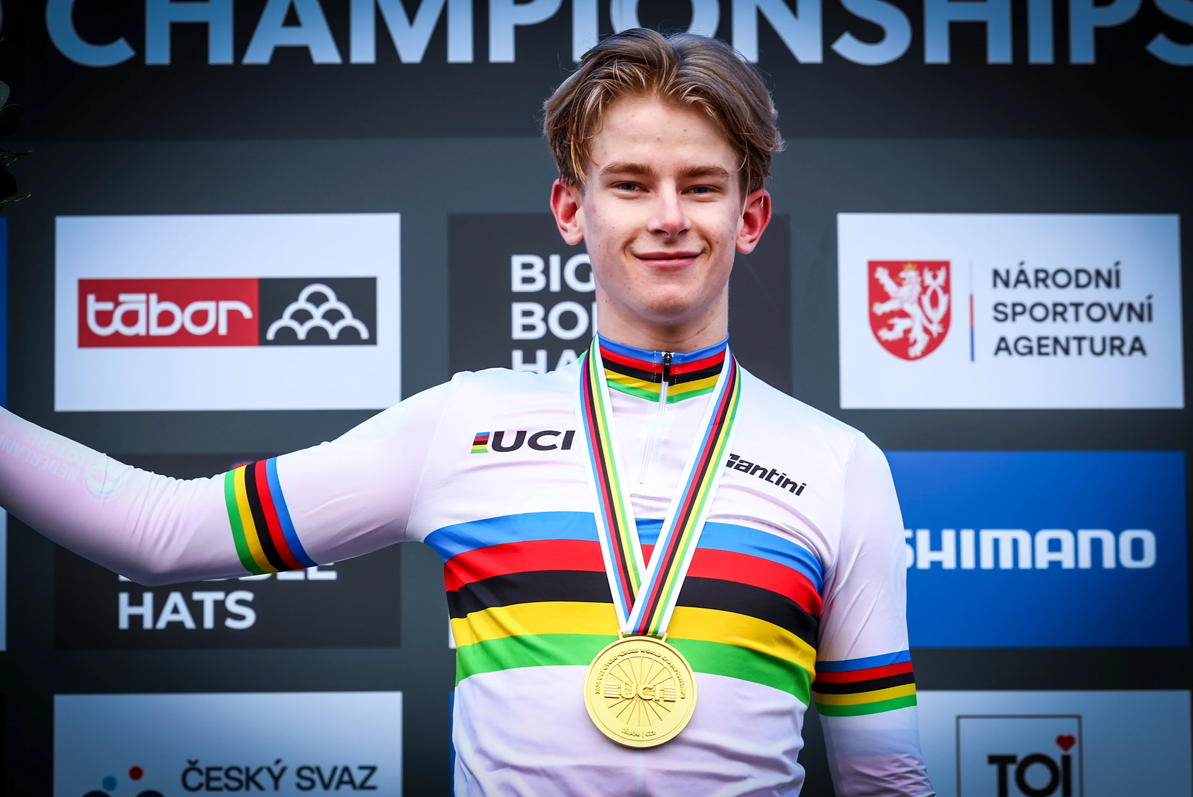 Dutch gold medallist Tibor Del Grosso celebrates on the podium in the rainbow jersey after winning the U23 men race event of the Cyclocross World Championships on Saturday 03 February 2024 in Tabor, Czech Republic. BELGA PHOTO DAVID PINTENS