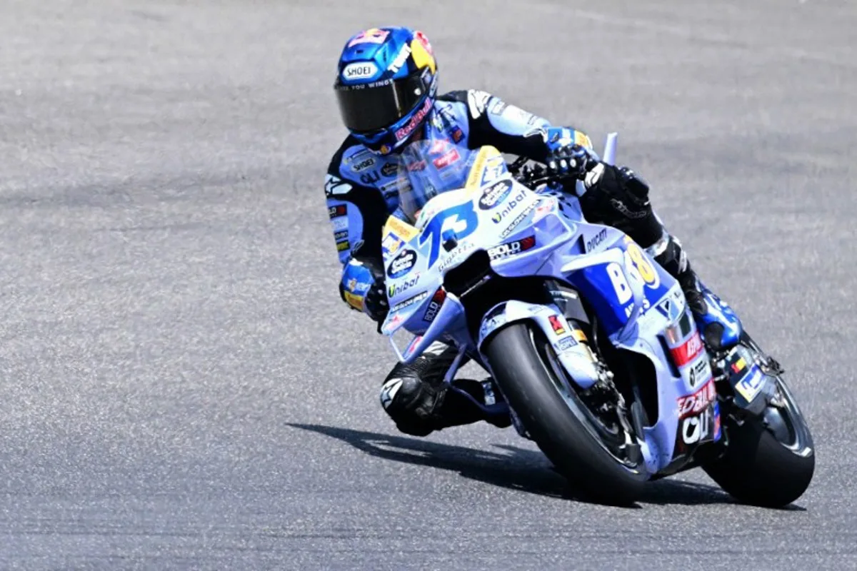 BK8 Gresini Racing MotoGP team's Spanish MotoGP rider Alex Marquez steers his motorbike during the Italian Moto GP Grand Prix at Mugello circuit, in Mugello, near Florence, on June 22, 2025. Tiziana FABI / AFP