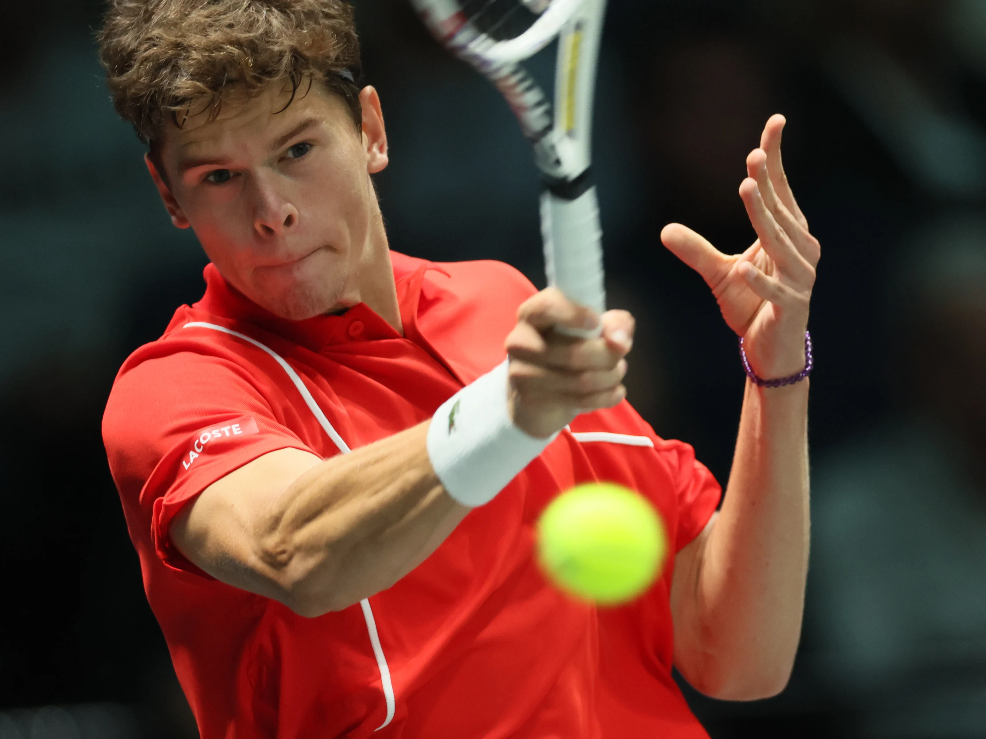 Belgian Alexander Blockx reacts during a game between Italian Berrettini and Belgian Blockx, the first match in the group A Davis Cup Finals group stage between Italy and Belgium, Friday 13 September 2024, at the Unipol Arena, in Bologna, Italy. BELGA PHOTO BENOIT DOPPAGNE