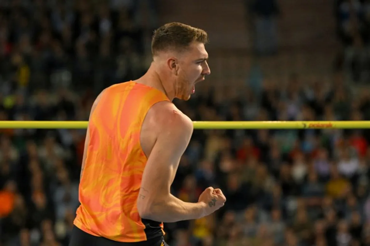 Belgium's Thomas Carmoy reacts after competing in the Men's High Jump final of the Memorial Van Damme Diamond League athletics finals at the Roi Baudouin Stadium in Brussels on September 14, 2024.  NICOLAS TUCAT / AFP