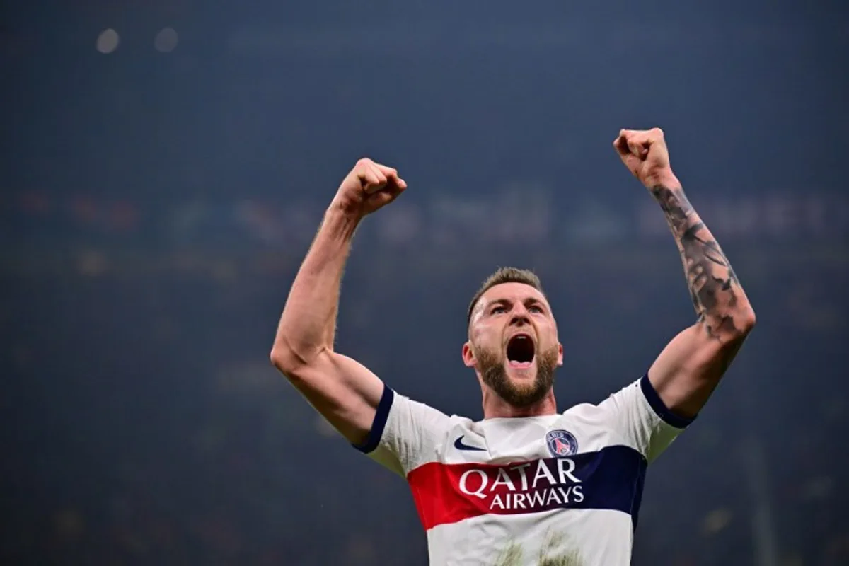 PAris Saint-Germain's Slovak defender #37 Milan Skriniar celebrates after scoring the team's first goal during the UEFA Champions League 1st round group F football match between AC Milan and Paris Saint-Germain at the San Siro stadium in Milan on November 7, 2023.   Marco BERTORELLO / AFP