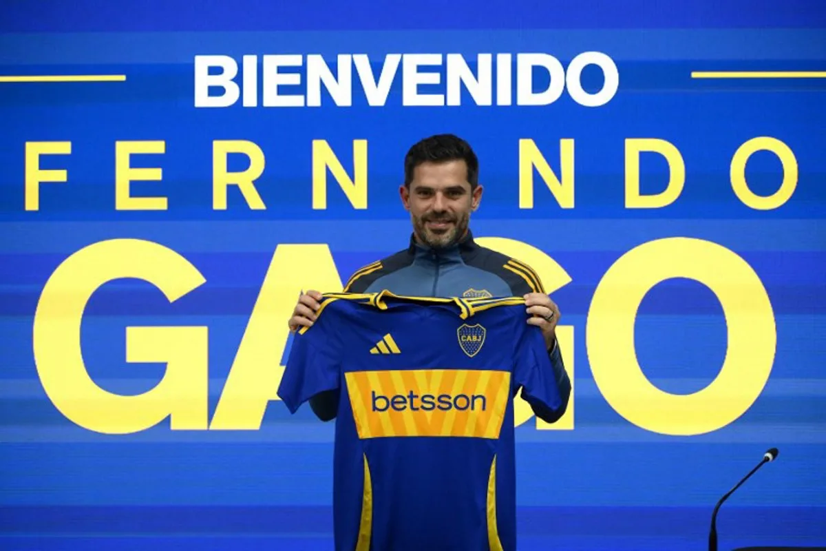 Boca Juniors' new head coach Fernando Gago poses for a photo during his presentation at the Boca Juniors training center, also known as Boca Predio, in Ezeiza, Buenos Aires province, on October 14, 2024.  Luis ROBAYO / AFP