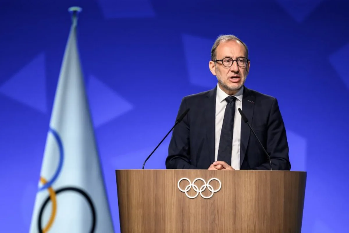 Director of the Organising Committee for the Alpes 2030 Winter Olympics Vincent Roberti speaks during an extraordinary session of the International Olympic Committee (IOC) in Lausanne on June 25, 2026. The roughly 100 members of IOC approved on June 25, 2026 the re-inclusion of ski mountaineering in the program for the Alpes 2030 Olympic Winter Games, which will take place in the French Alps, after the "additional sport" made its Olympic debut at Milan-Cortina in 2026. Fabrice COFFRINI / AFP