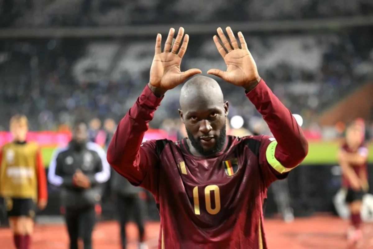 Belgium's forward #10 Romelu Lukaku greets supporters at the end of the UEFA Nations League Group A2 football match between Belgium and Italy at the King Baudouin Stadium in Brussels on November 14, 2024.  NICOLAS TUCAT / AFP