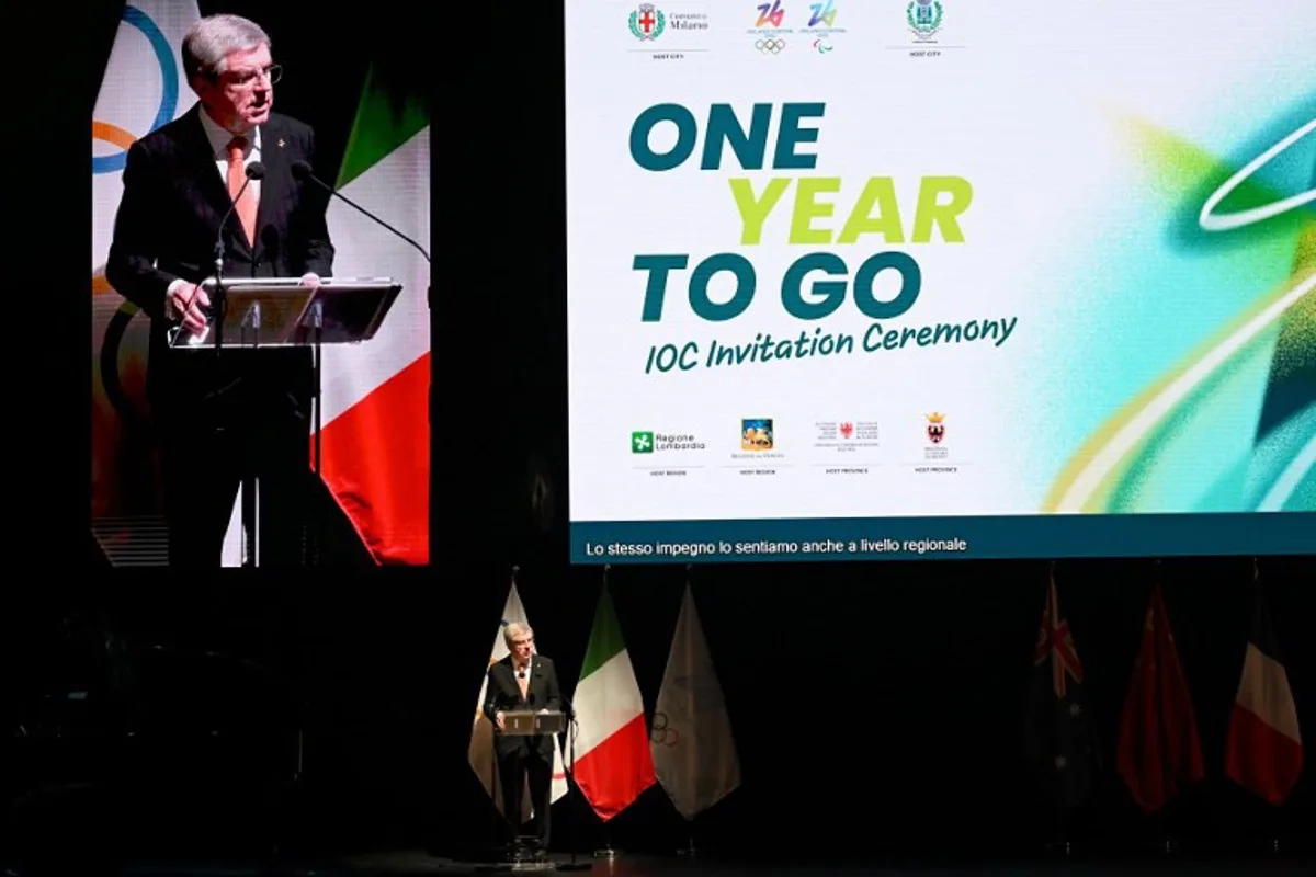 The President of the International Olympic Committee (IOC) Thomas Bach attends a ceremony to mark one year until the start of Milano Cortina Olympics in Strehler Theatre, in Milan, on February 6, 2025, ahead of the Milano Cortina 2026 Winter Olympic and Paralympic Games.  MARCO BERTORELLO / AFP