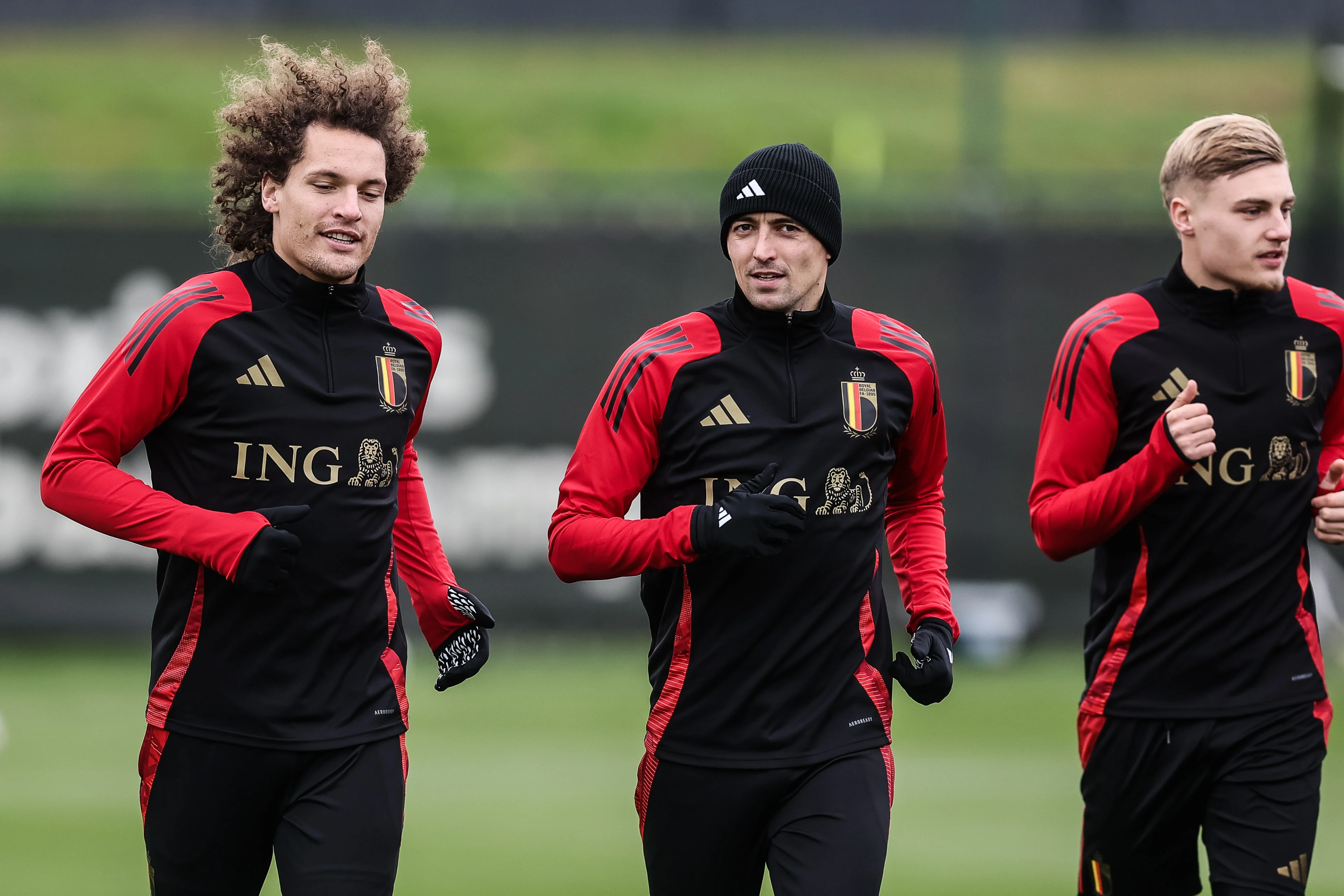 Belgium's Wout Faes, Belgium's Timothy Castagne and Belgium's Norman Bassette pictured during a training session of Belgian national soccer team the Red Devils, ahead of tomorrow's game against Israel in the Nations League group phase, Saturday 16 November 2024 in Tubize. BELGA PHOTO BRUNO FAHY