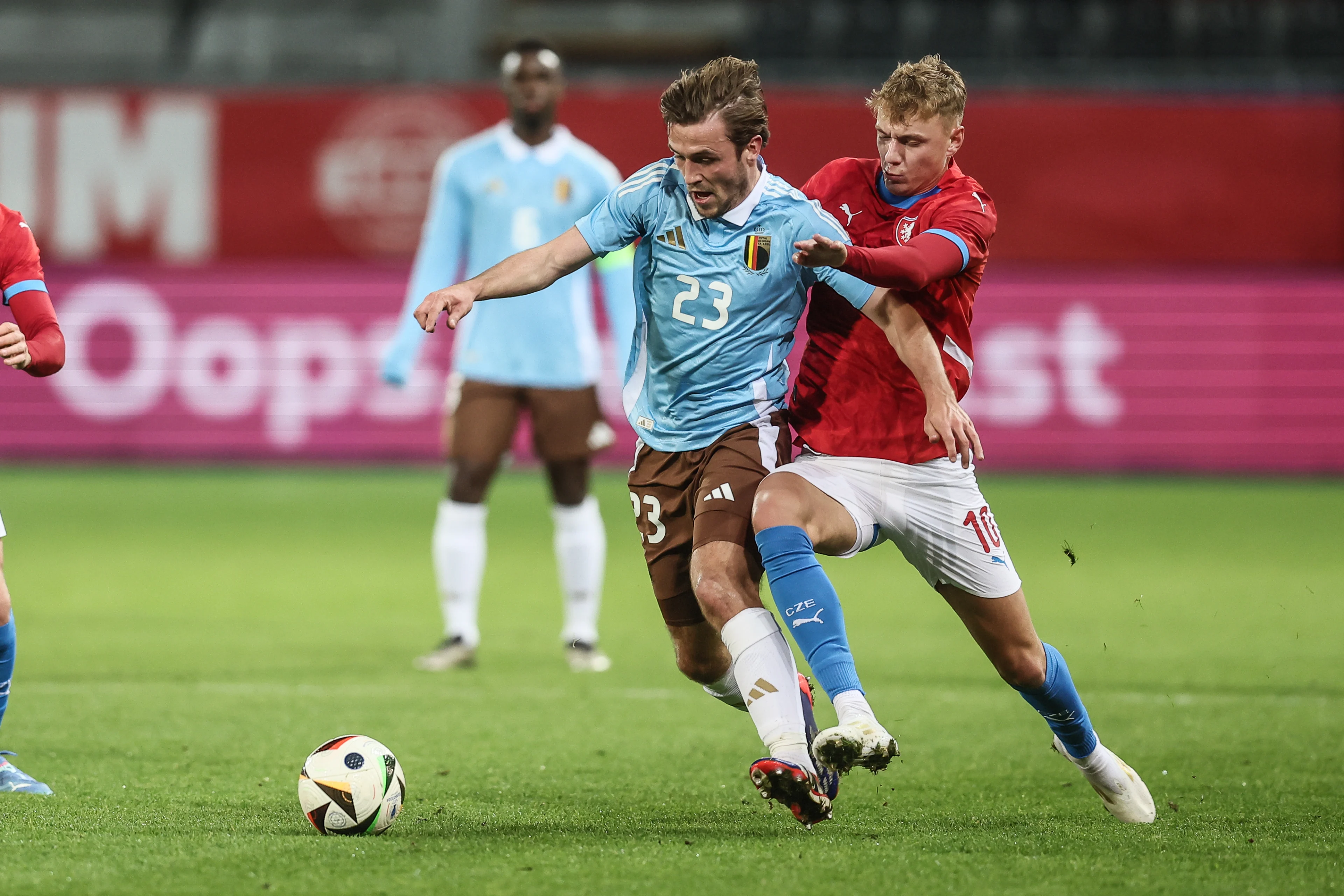 Belgium's Tuur Rommens and Czechia's Adam Karabec fight for the ball during a soccer game between the U21 youth team of the Belgian national team Red Devils and the U21 of Czechia, in Heverlee, Leuven, on Friday 15 November 2024, the first leg of the play-offs for the 2025 UEFA European Under21 Championship. BELGA PHOTO BRUNO FAHY