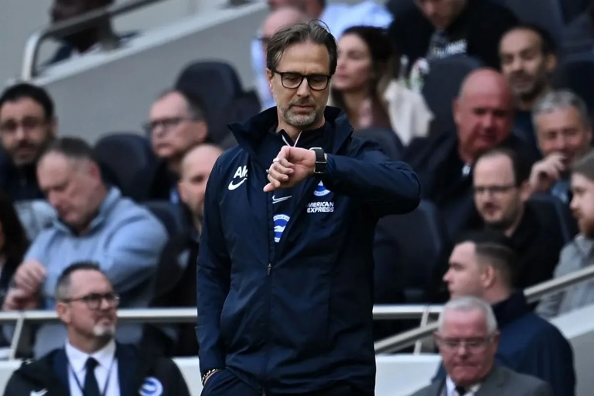 Brighton's first team coach Andrea Maldera gestures on the touchline during the English Premier League football match between Tottenham Hotspur and Brighton and Hove Albion at Tottenham Hotspur Stadium in London, on April 8, 2023. Ben Stansall / AFP