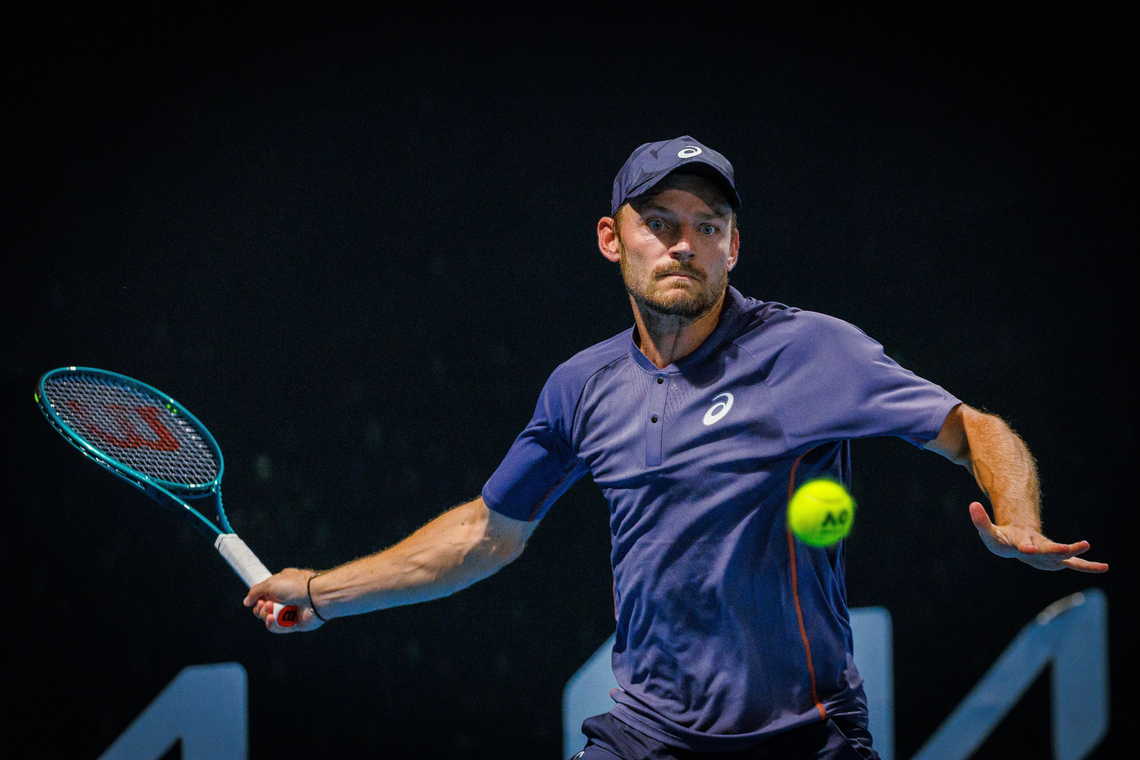 Belgian David Goffin pictured in action during a tennis match between Belgian Goffin and French Bonzi, in the first round of the men's singles at the 'Australian Open' Grand Slam tennis tournament, Monday 13 January 2025 in Melbourne Park, Melbourne, Australia. The 2025 edition of the Australian Grand Slam takes place from January 12th to January 26th. Goffin has lost 1-6, 2-6, 6-7. BELGA PHOTO PATRICK HAMILTON