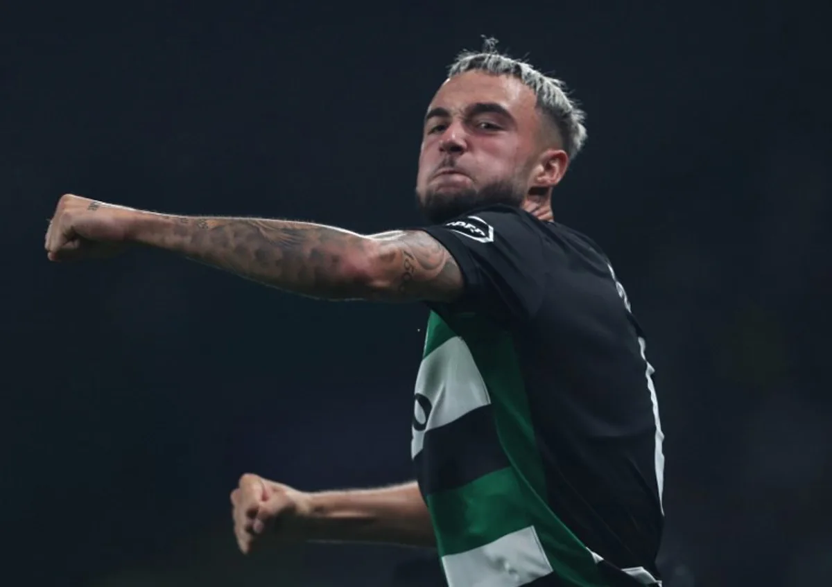 Sporting Lisbon's Belgian defender #06 Zeno Debast celebrates scoring his team's second goal during the UEFA Champions League 1st round day 1 football match between Sporting CP and LOSC Lille, at Alvalade stadium in Lisbon, on September 17, 2024.  CARLOS COSTA / AFP