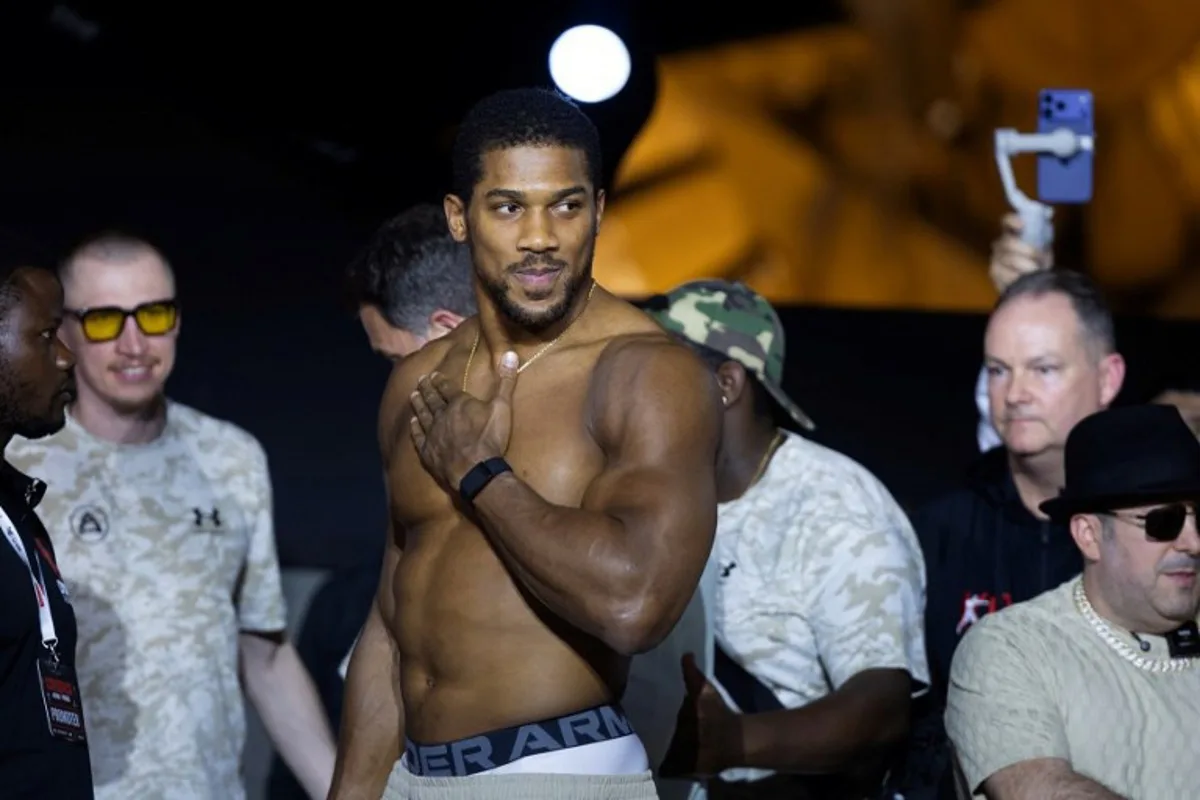 Britain's boxer Anthony Joshua attends the weigh-in ceremony on the eve of his heavyweight fight against Albania's boxer Kristian Prenga, in Jeddah on July 24, 2026. Briton Anthony Joshua, a two-time heavyweight champion, will face Kristian Prenga at "The Comeback" event in Saudi Arabia on July 25. AFP