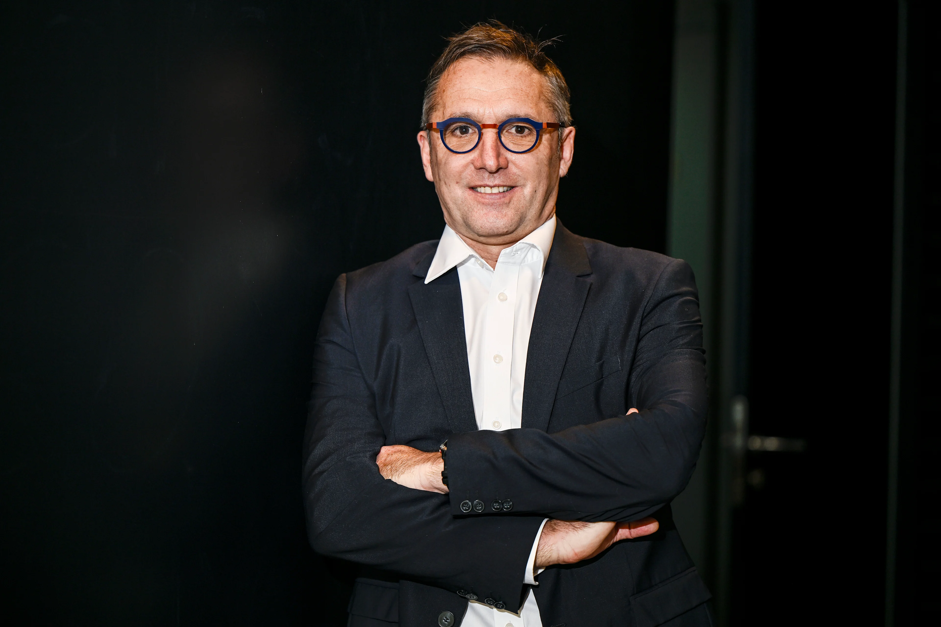 Lotto Dstny CEO Stephane Heulot poses for the photographer during the Lotto Cycling Team media day, in Temse, Friday 03 January 2025. BELGA PHOTO GOYVAERTS