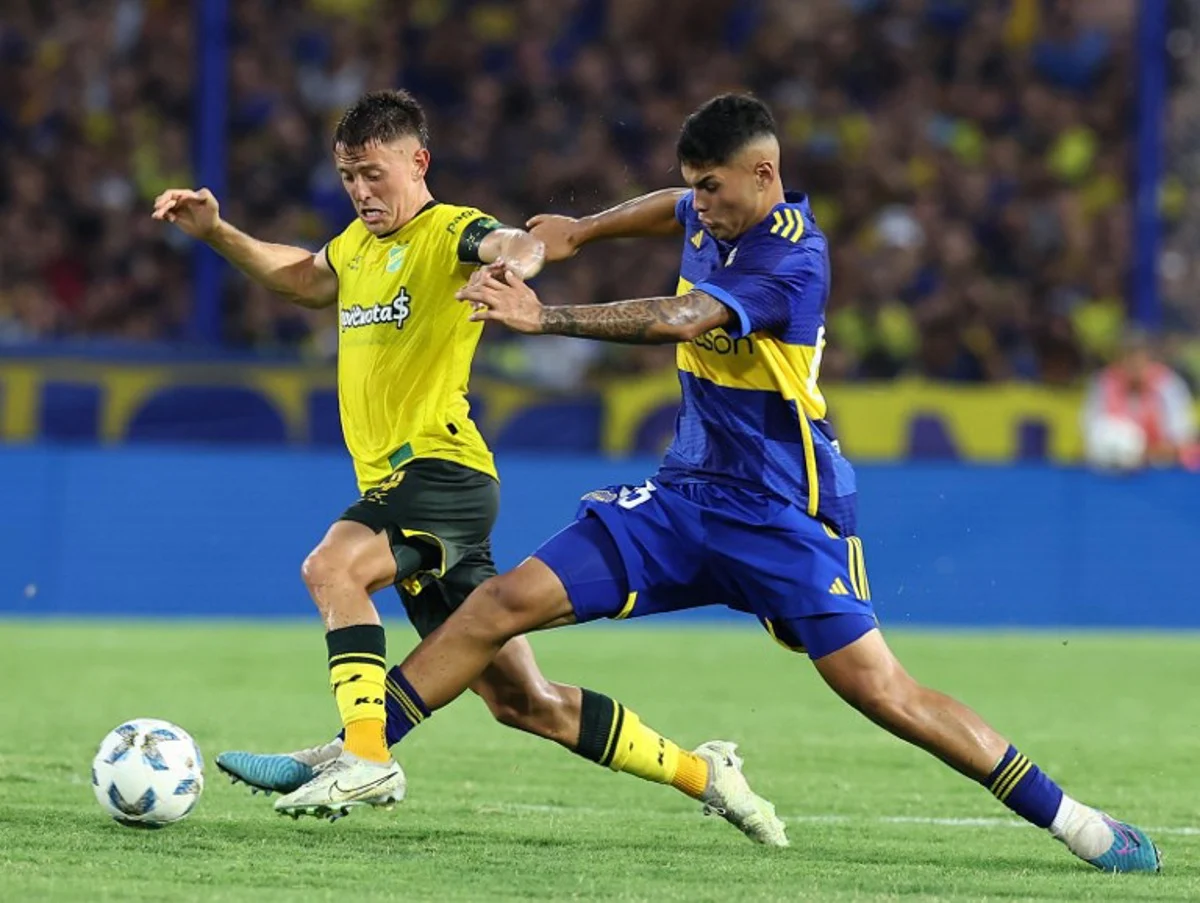 Boca Juniors' midfielder Mauricio Benitez (R) vies for the ball with Defensa y Justicia's defender Nicolas Tripichio during the Argentine Professional Football League Cup 2024 football match between Boca Juniors and Defensa y Justicia at La Bombonera stadium in Buenos Aires, on February 10, 2024.  ALEJANDRO PAGNI / AFP