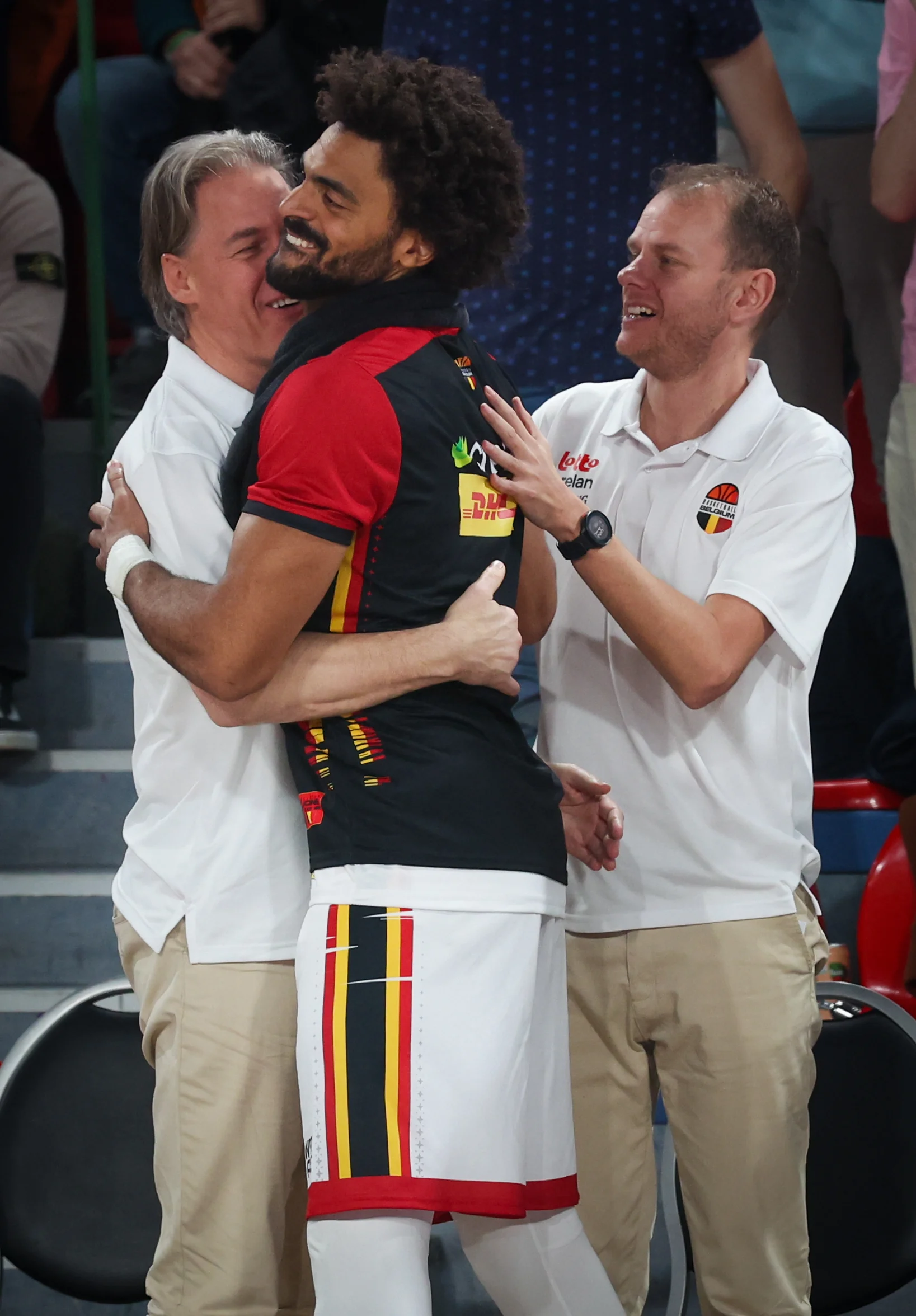 Belgium's manager Jacques Stas, Belgium's assistant coach Kristof Michiels and Belgium's Jean-Marc Mwema celebrate during a basketball match between Belgium's national team Belgian Lions and Slovakia, Thursday 20 February 2025 in Charleroi, game 5/6 in the group stage of the qualifications for the Eurobasket 2025 European championships. BELGA PHOTO VIRGINIE LEFOUR