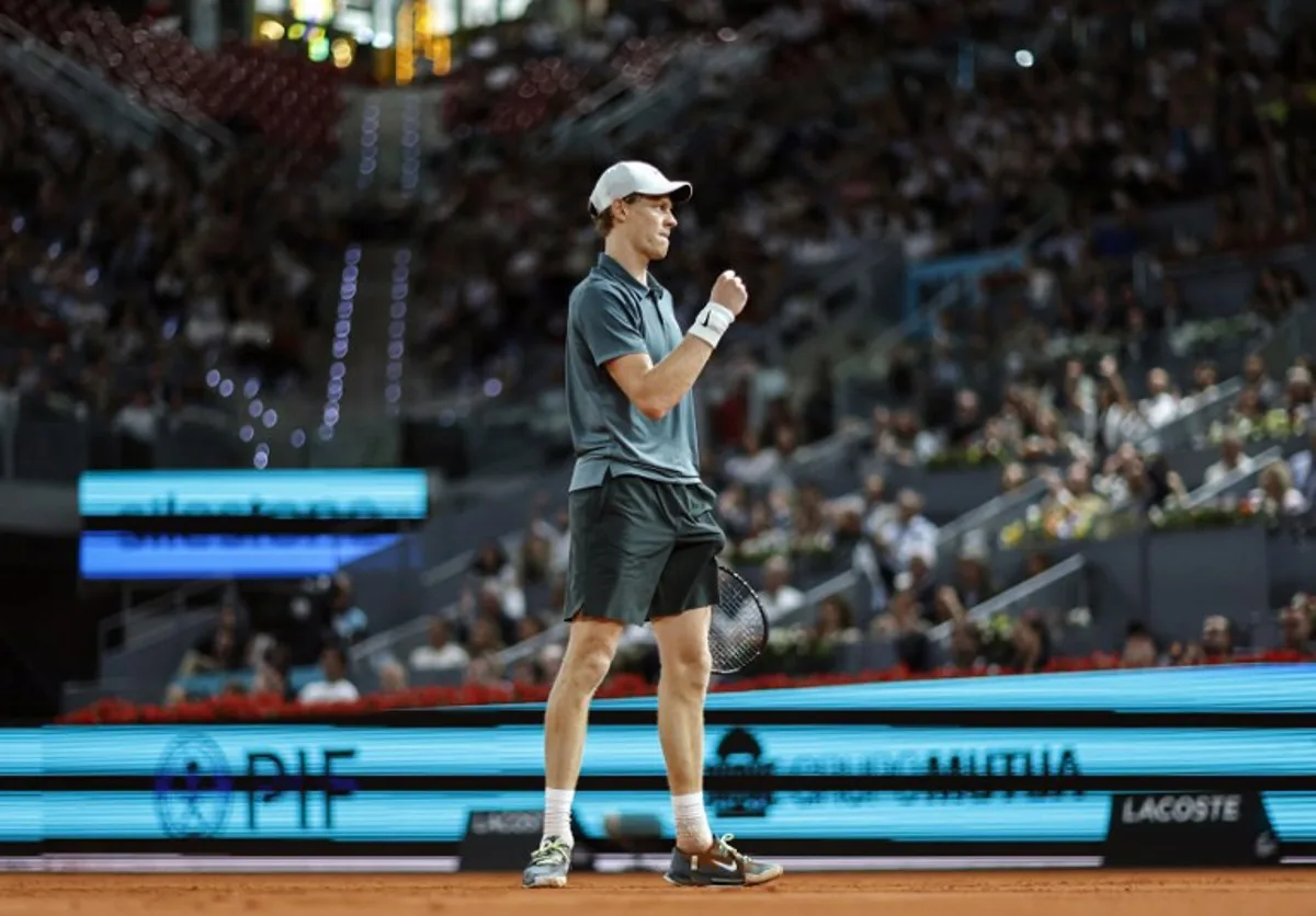 Italy's Jannik Sinner celebrates winning a game against Spain's Rafael Jodar during their 2026 ATP Tour Madrid Open tennis tournament quarterfinal singles match at the Caja Magica in Madrid, on April 29, 2026.  OSCAR DEL POZO / AFP