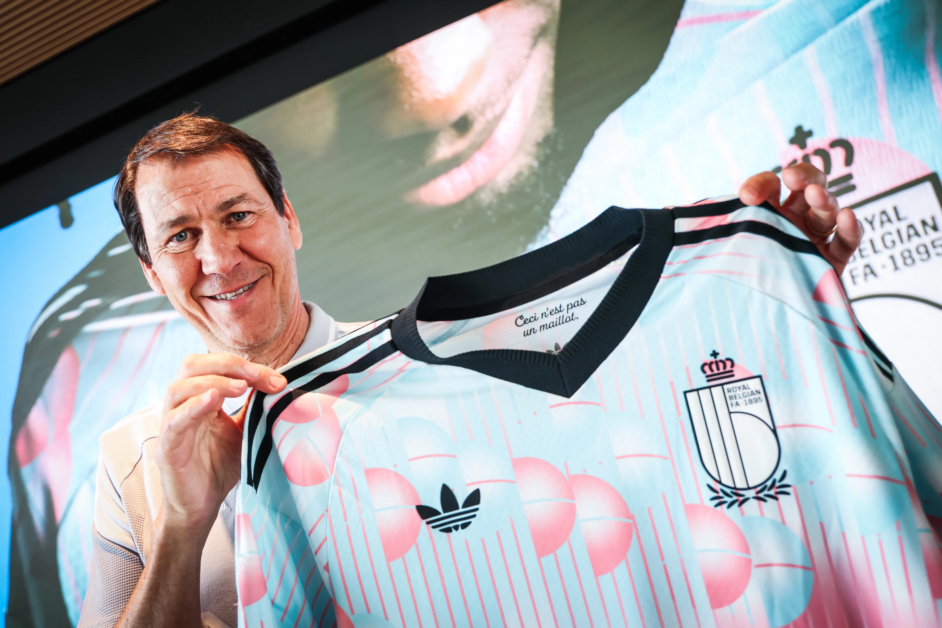 Belgium's head coach Rudi Garcia poses for the photographer with the new national shirt after a press conference of the Red Devils, the Belgian national soccer team, in Tubize on Friday 20 March 2026. The team is preparing for its friendly games against the United States and Mexico. These games are preparation games of the 2026 World Cup. BELGA PHOTO BRUNO FAHY