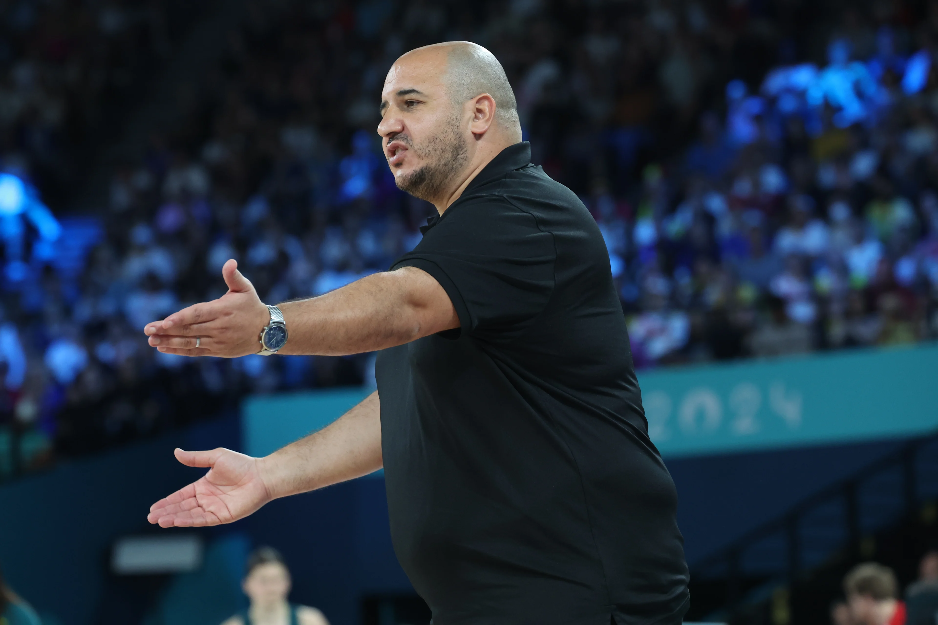 Belgium's head coach Rachid Meziane gestures during a basketball game between Australia and Belgian national team the Belgian Cats, the bronze medal game of the women's tournament at the Paris 2024 Olympic Games, on Sunday 11 August 2024 in Paris, France. The Games of the XXXIII Olympiad are taking place in Paris from 26 July to 11 August. The Belgian delegation counts 165 athletes competing in 21 sports. BELGA PHOTO VIRGINIE LEFOUR