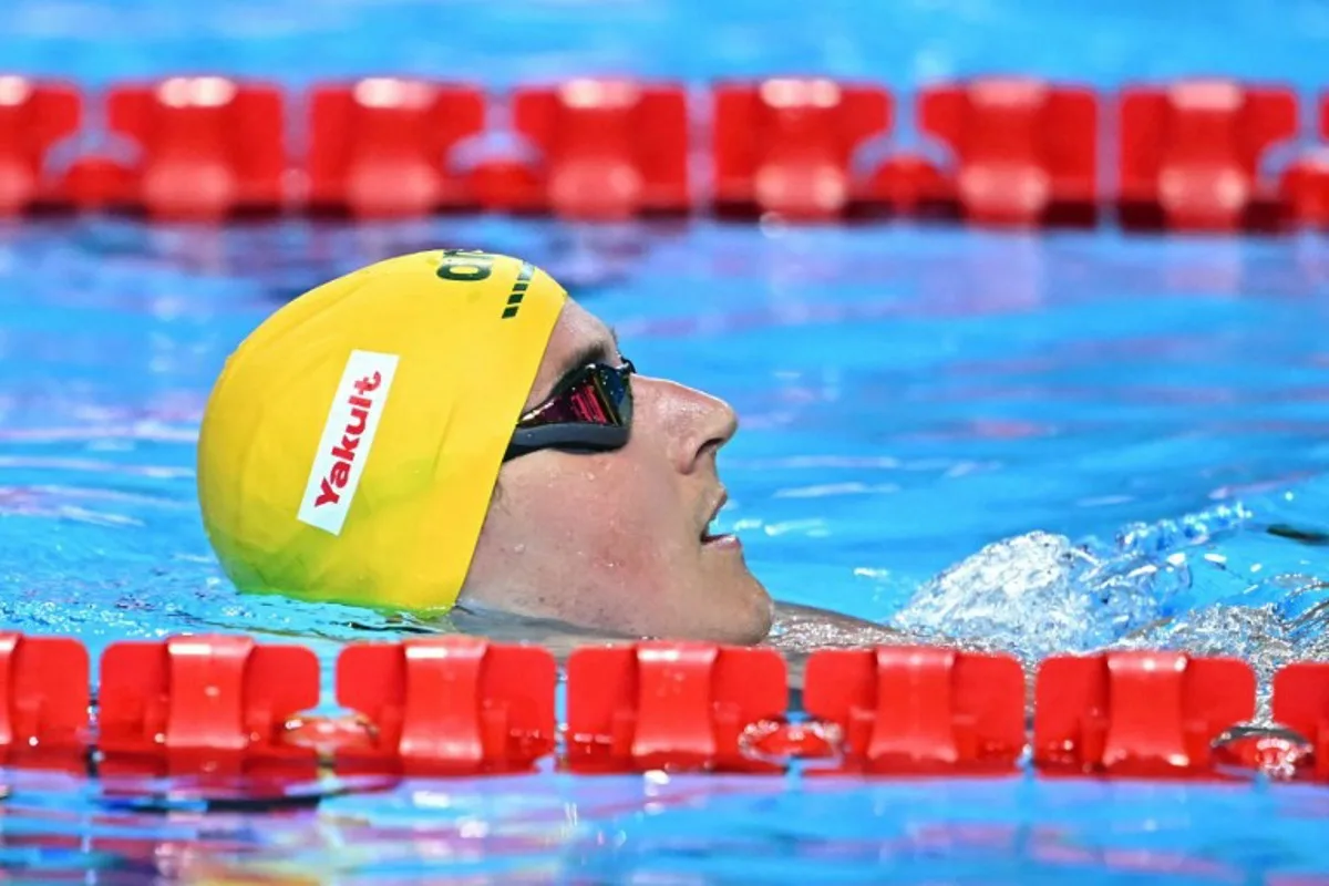 Australia's swimmer Cameron McEvoy reacts after a semi-final of the men's 50m freestyle swimming event during the 2025 World Aquatics Championships in Singapore on August 1, 2025. MANAN VATSYAYANA / AFP