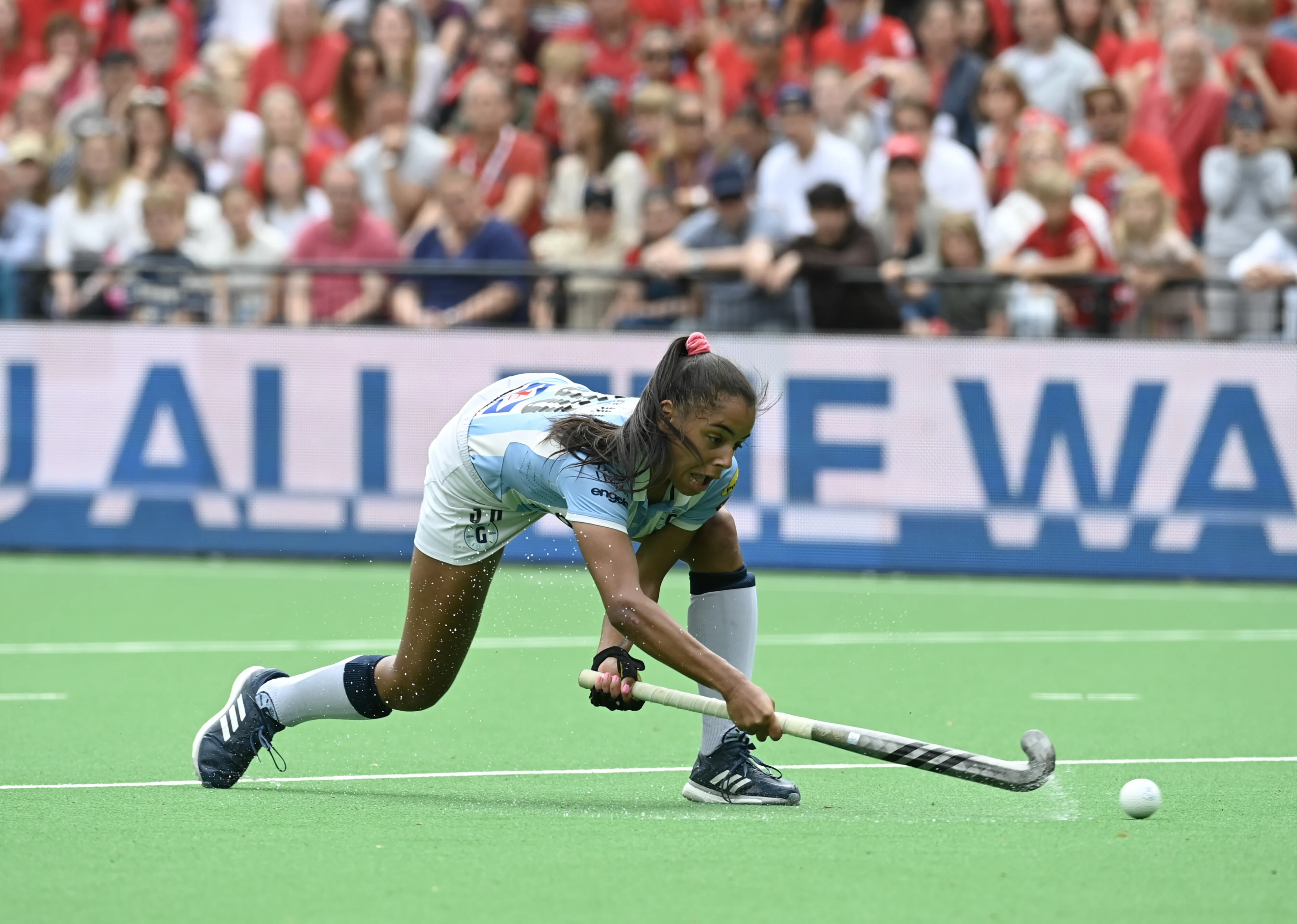 Gantoise's Ambre Ballenghien fights for the ball during a hockey game between KHC Dragons and Gantoise, Sunday 21 May 2023 in Brasschaat, the second leg of the finals in the play-offs for the Belgian Women Hockey League season 2022-2023. BELGA PHOTO JOHN THYS