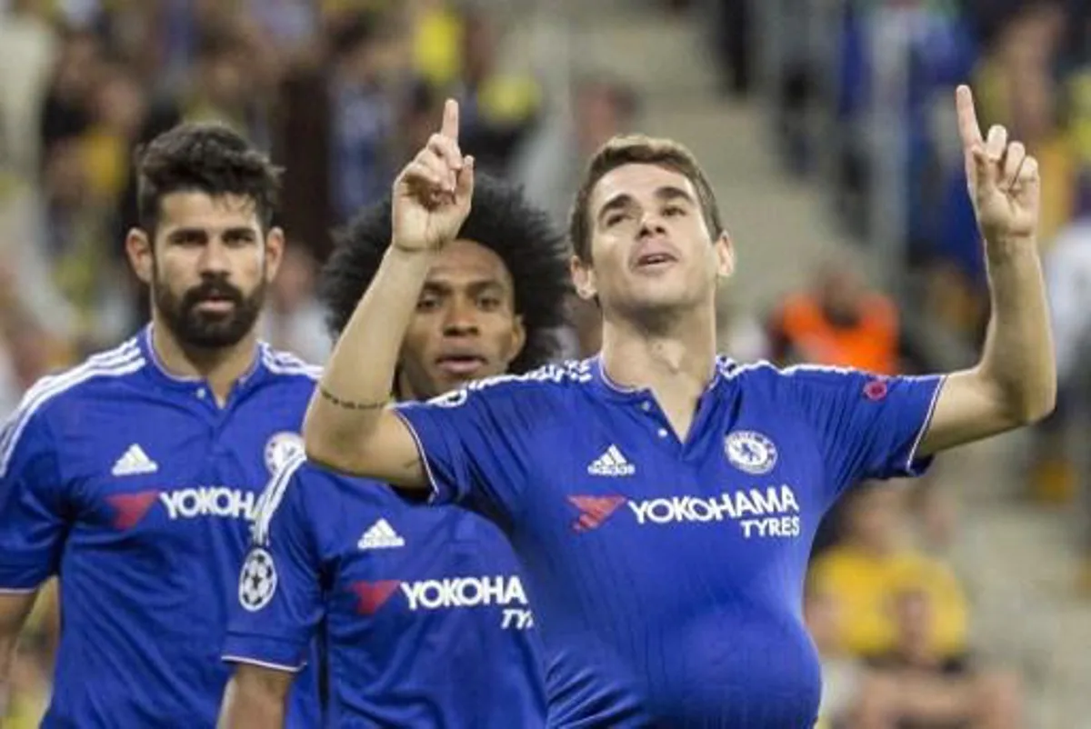 Chelsea's Brazilian midfielder Oscar (front) celebrates after scoring a goal during the UEFA Champions League, group G, football match between Maccabi Tel Aviv and Chelsea FC at the Sammy Ofer Stadium, in the Israeli coastal city of Haifa, on November 24, 2015. AFP PHOTO / JACK GUEZ