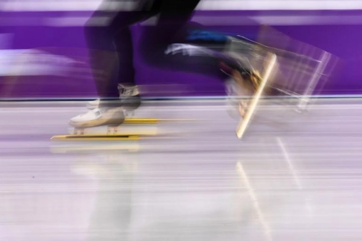 Athletes compete in the men's 5,000m relay short track speed skating B final event during the Pyeongchang 2018 Winter Olympic Games, at the Gangneung Ice Arena in Gangneung on February 22, 2018.  ARIS MESSINIS / AFP