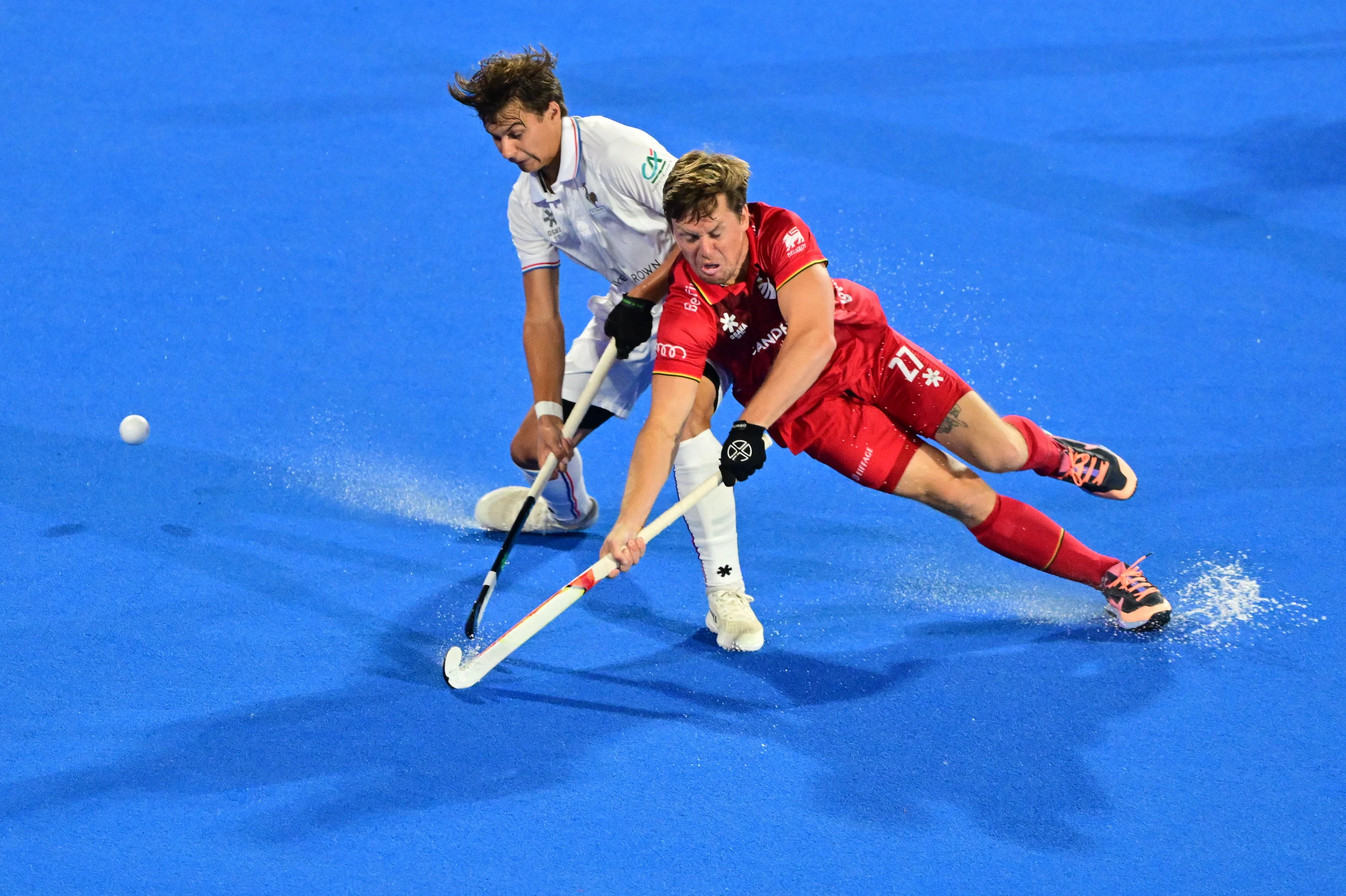 France's Gaspard Baumgarten and Belgium's Tom Boon pictured in action during a hockey game between Belgium's Red Lions and France, the first (out of three) matches during the group stage of the men's 2026 Hockey World Cup, Saturday 15 August 2026 in Wavre. The 2026 edition of the Hockey World Cup takes place in Belgium and The Netherlands from August 15 to August 30. BELGA PHOTO DIRK WAEM